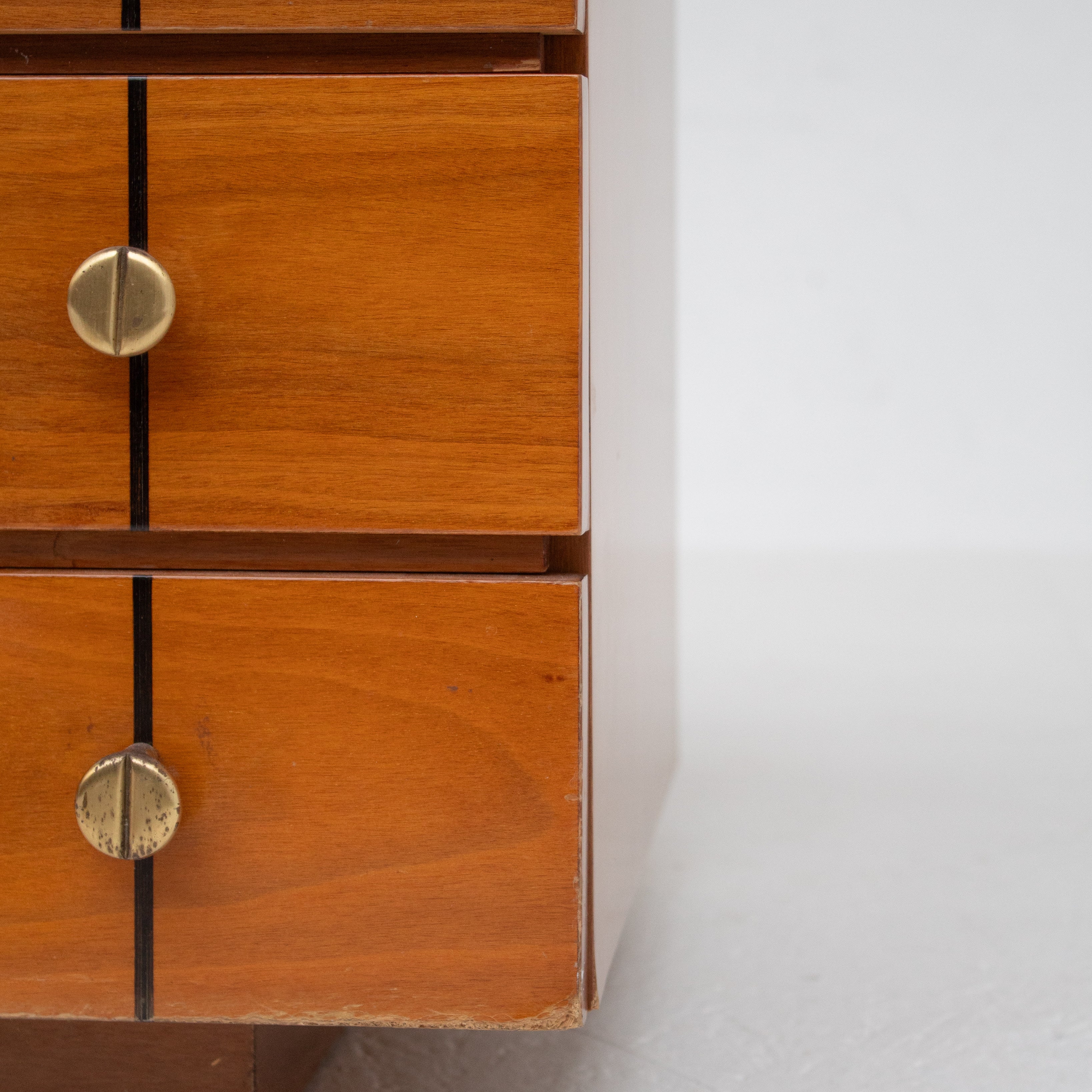 Set of Mid Century Nightstands in Wood — top view of wooden surface with brass knobs