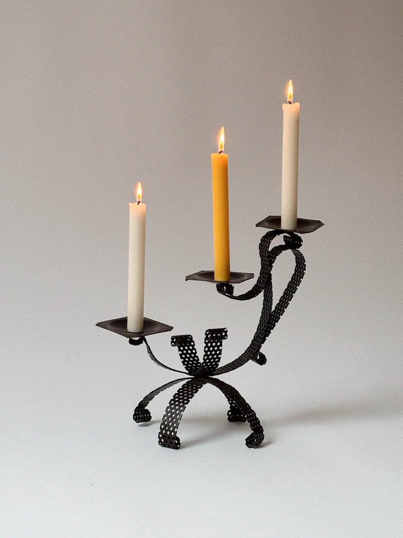 Handmade Metal 3 Arm Candleholder, Poland — close-up of black metal design with candles