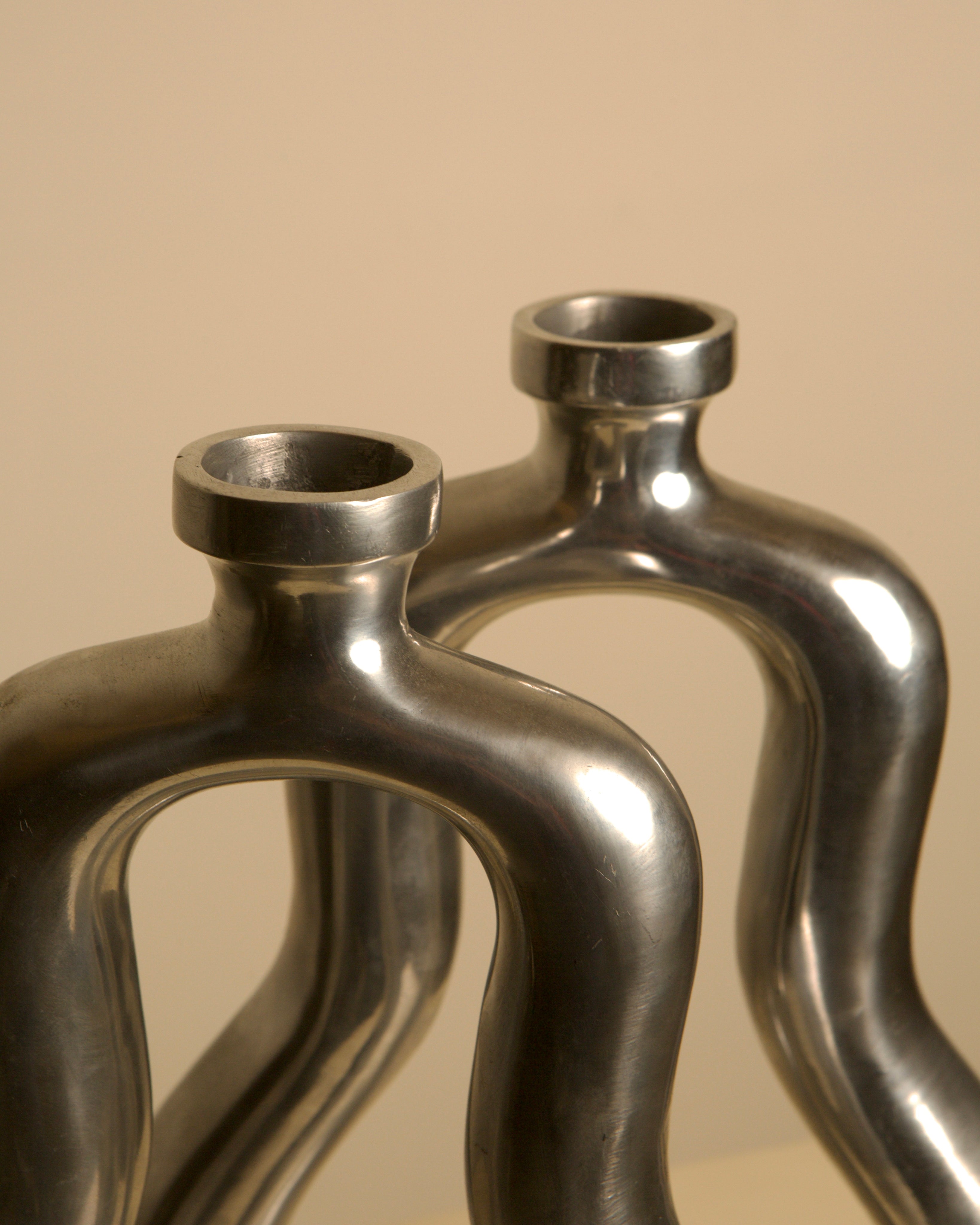 Pair of Italian Cast Aluminum Vases 1980s — close-up of metallic surface details