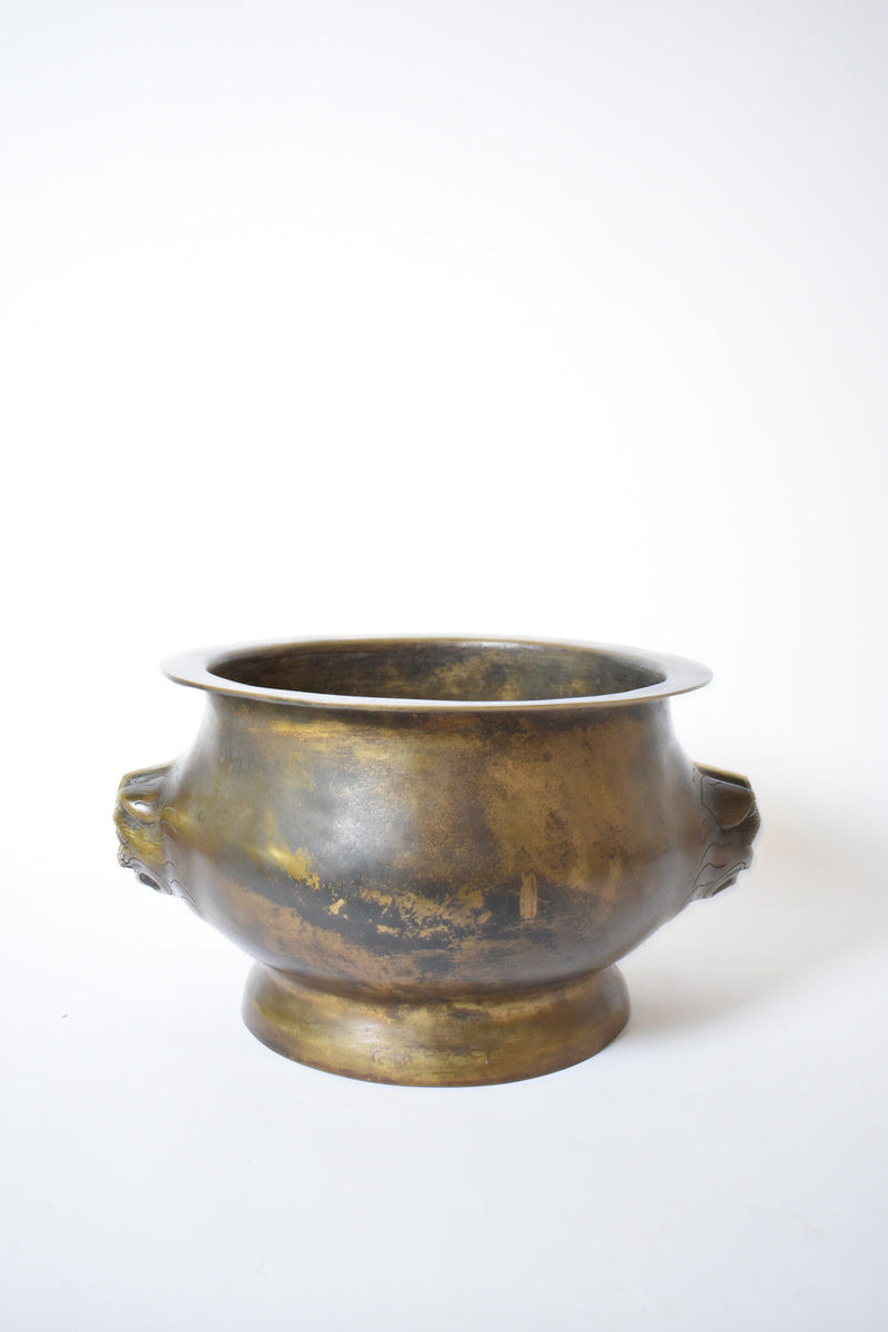 The Bronze Cup with Animal Figures Handles, XIXth c by Barracuda Interiors features a large round form, wide rim, and two ornate animal-shaped handles, beautifully showcased against a plain white background.