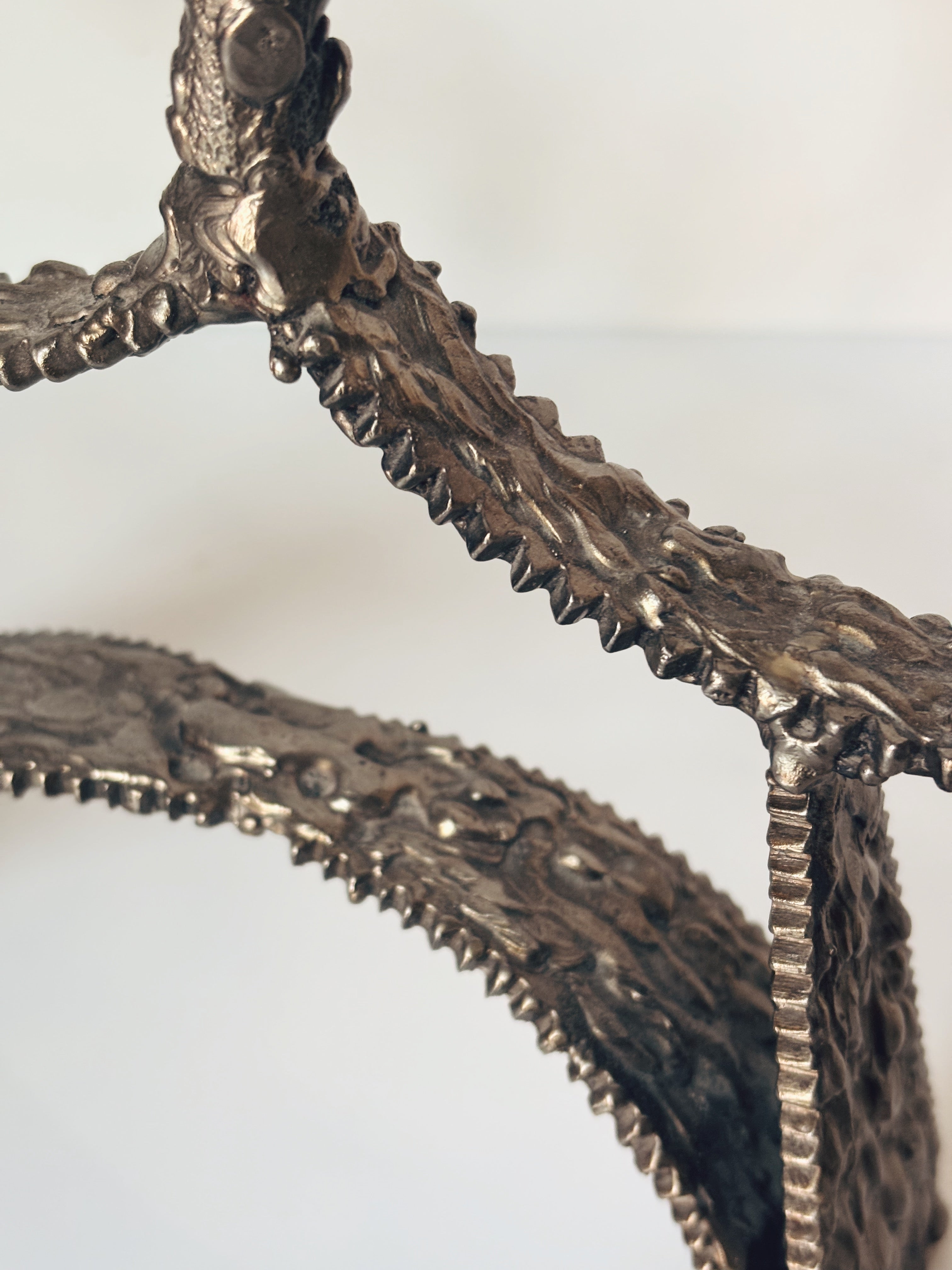 Molten Metal 3 Arm Candlestick — close-up