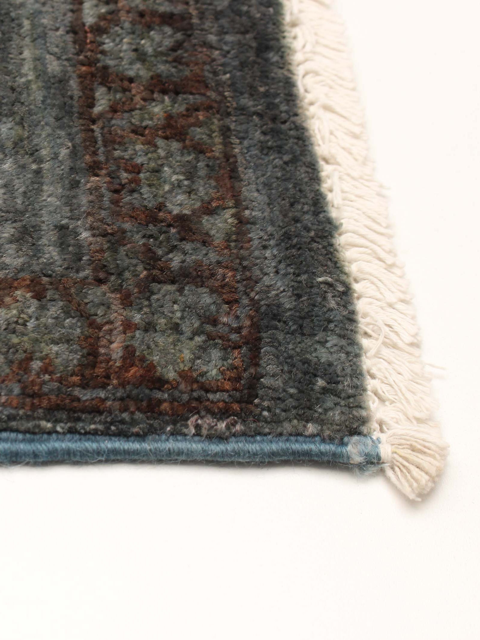 overdyed rug in heron 183 x 269 cm — side angle