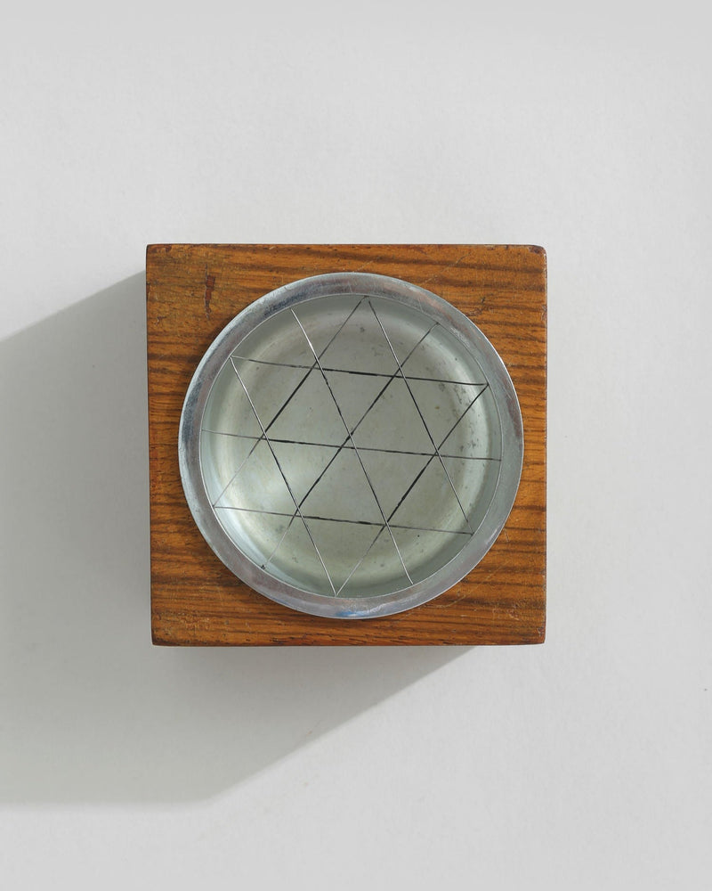 Mid-century wooden ashtray with geometric metal insert detail