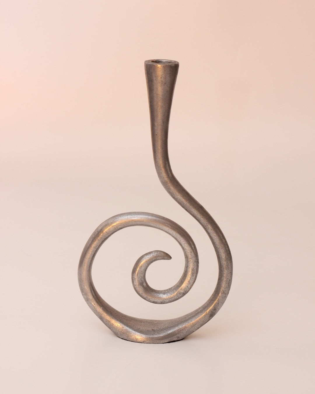 Candelabros Estaño — close-up of handcrafted silver candle holder