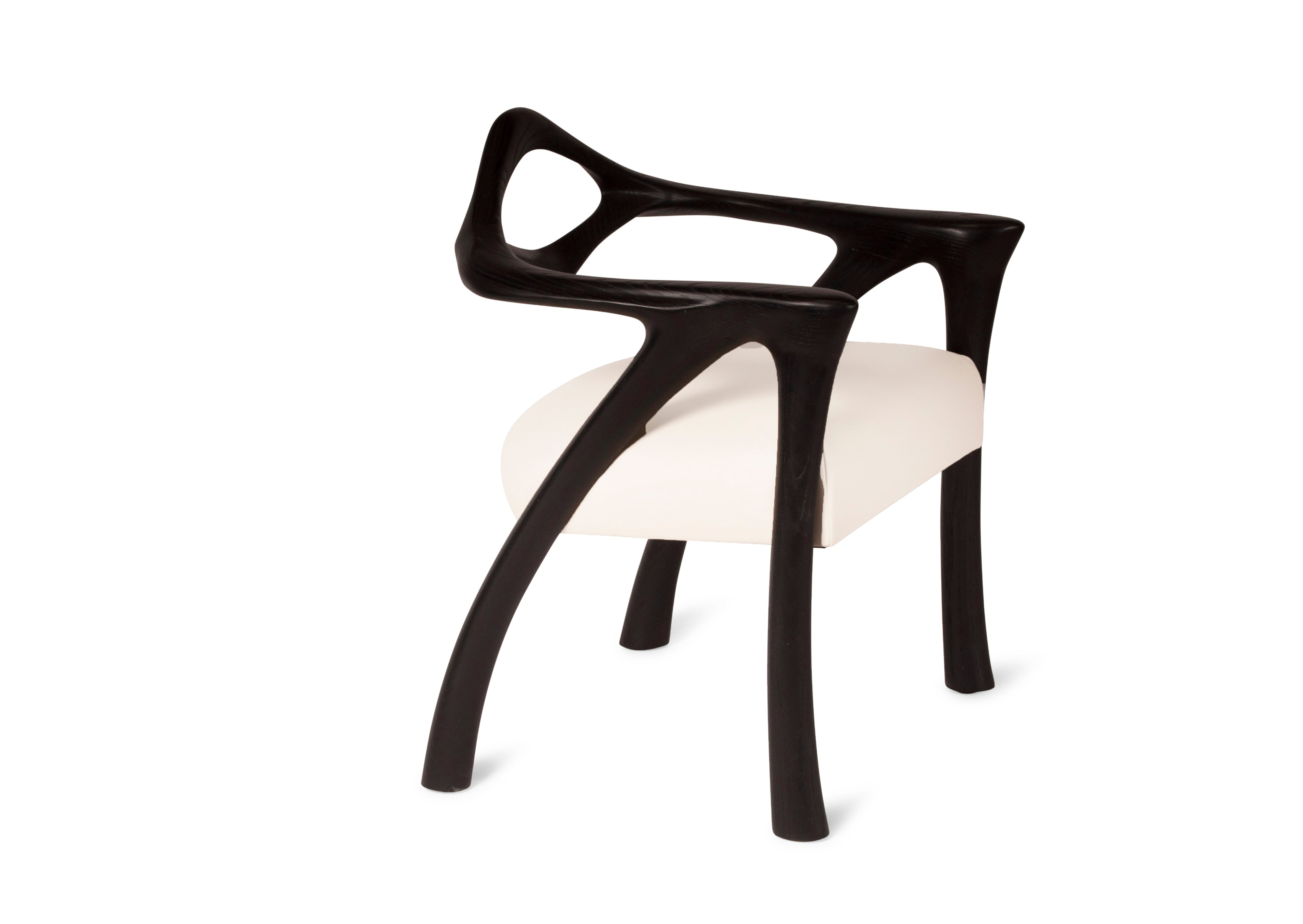 Darcey Armchair in Ash wood by Amorph — angled view in modern living room