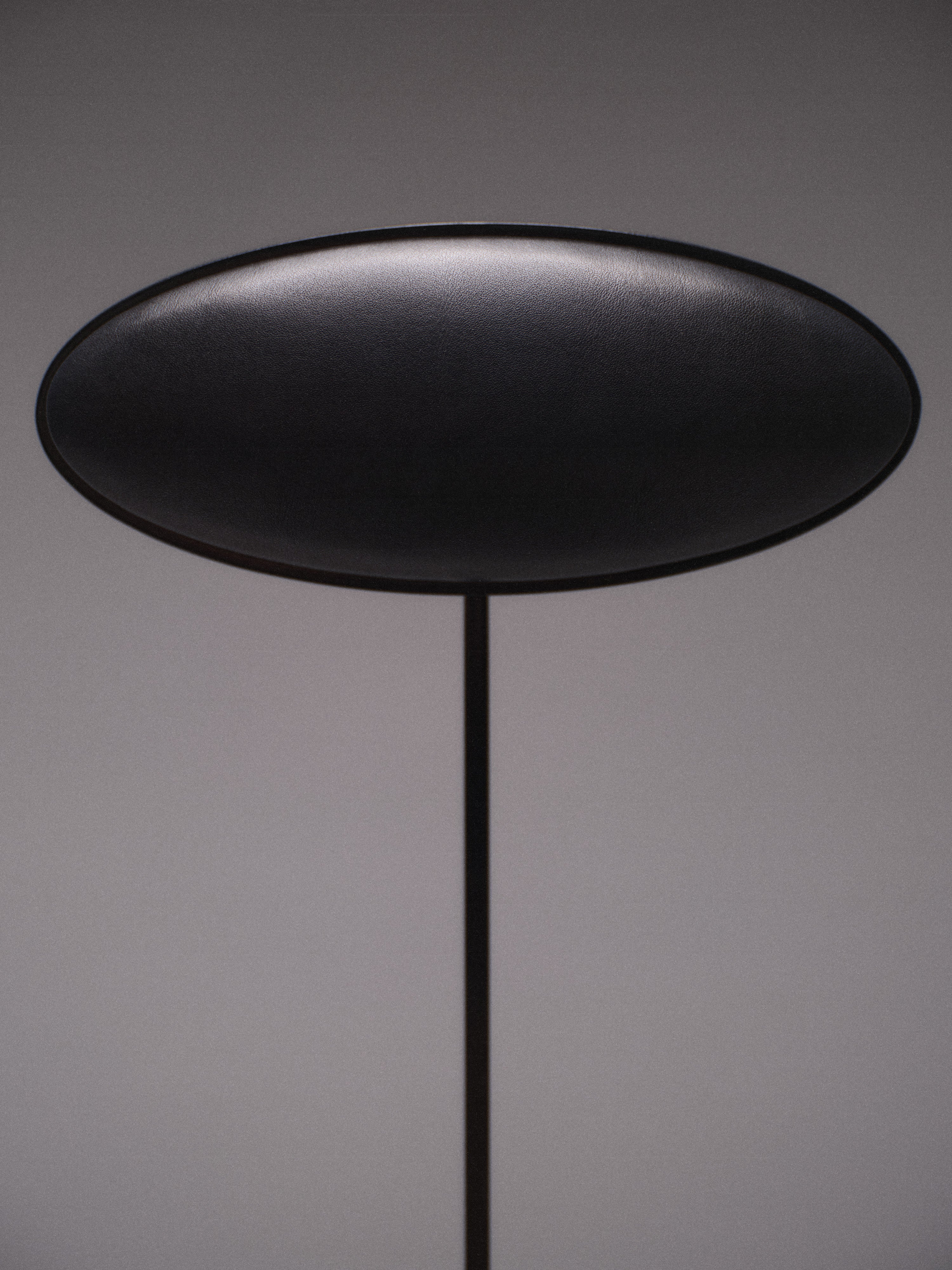 Giulio Stool — top view of black oval seat