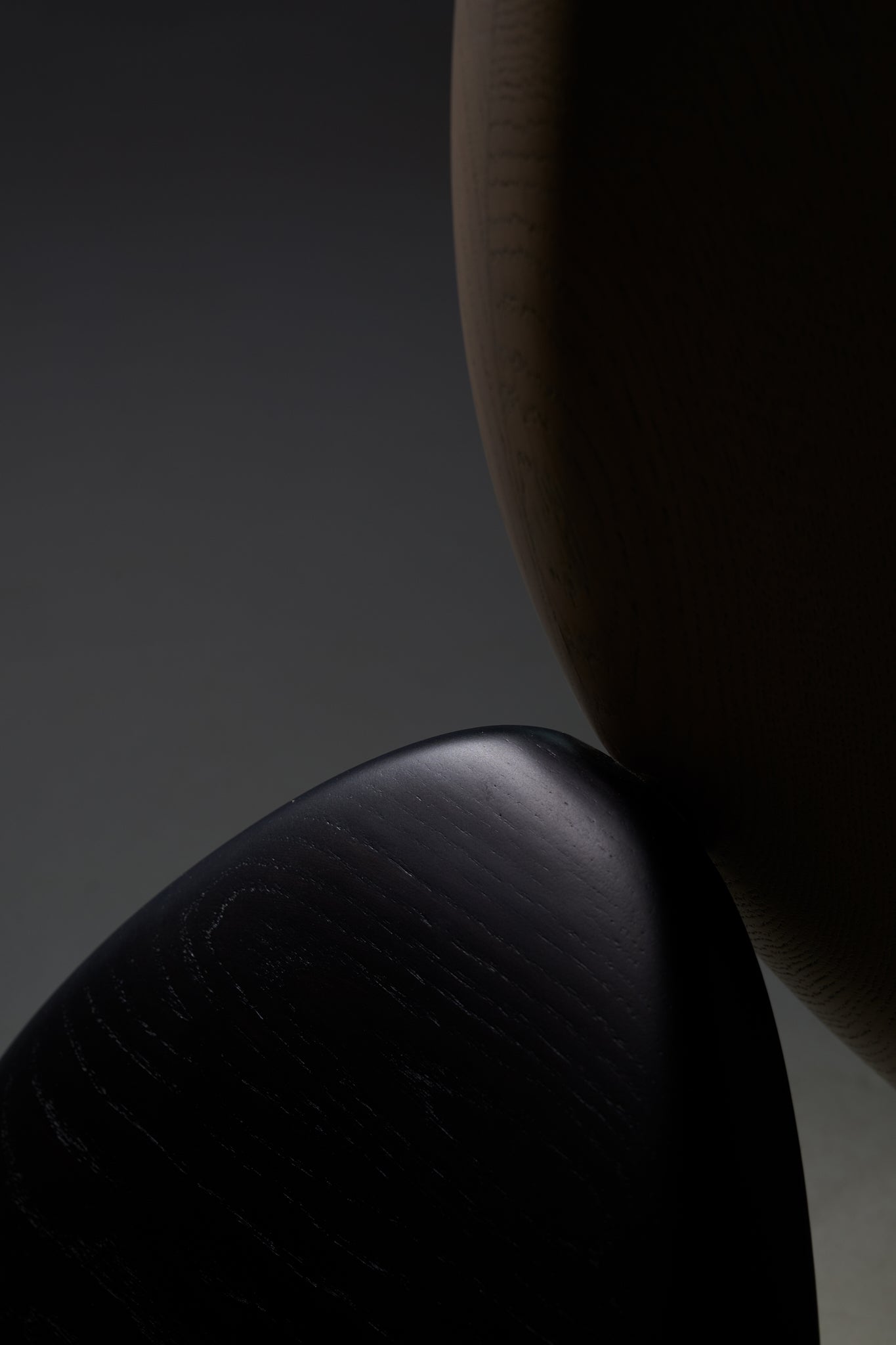 Kies' Side Table — close-up of black and natural wood details