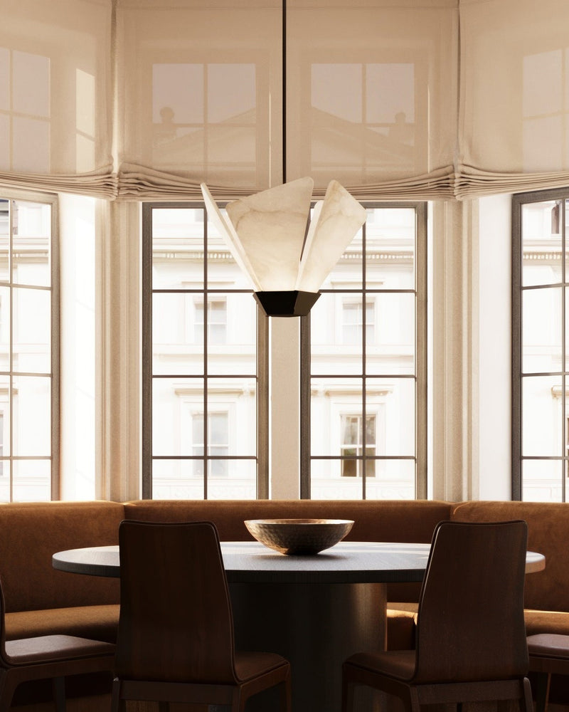Shard pendant light with sculptural white shades in modern dining room