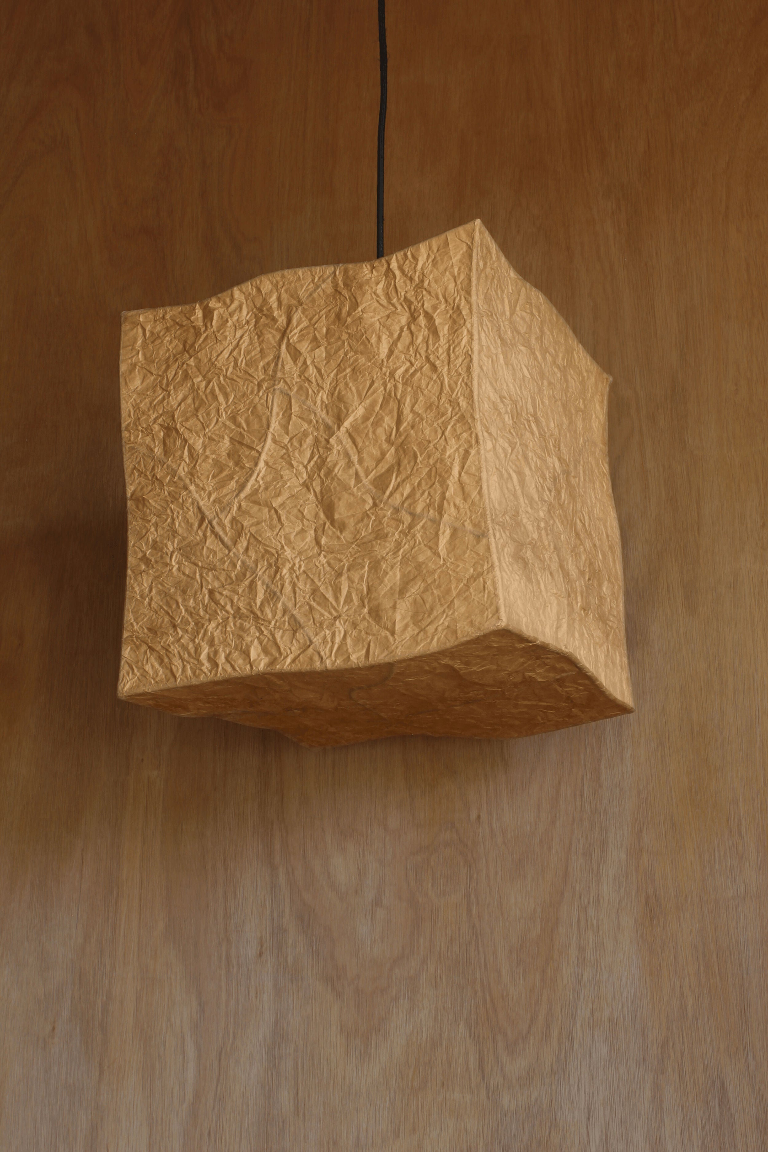 Hanging Dolmen' Pendant Light — side angle showing textured gold finish