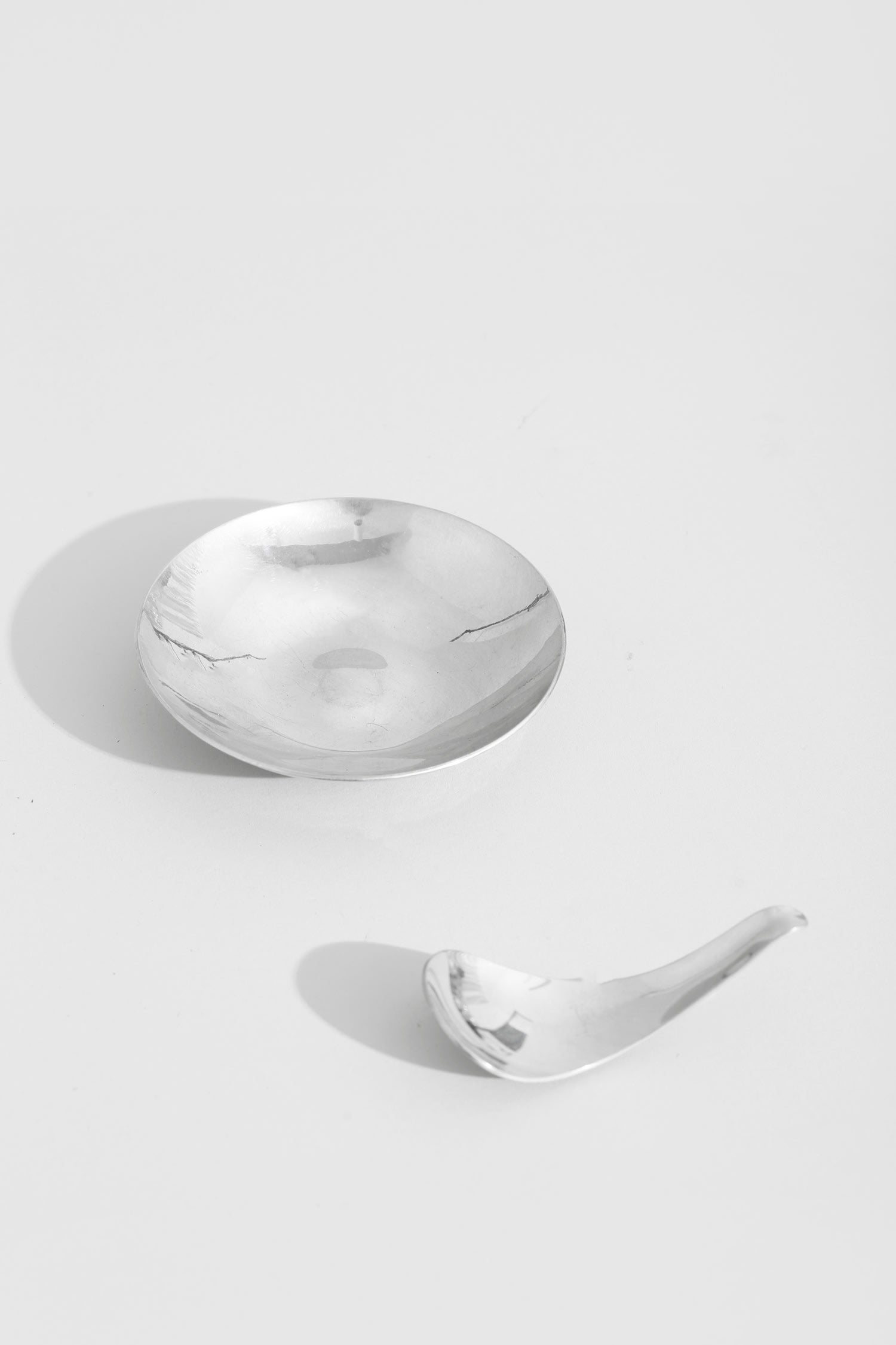 Sculptural Chrome Dish and Spoon — detail view
