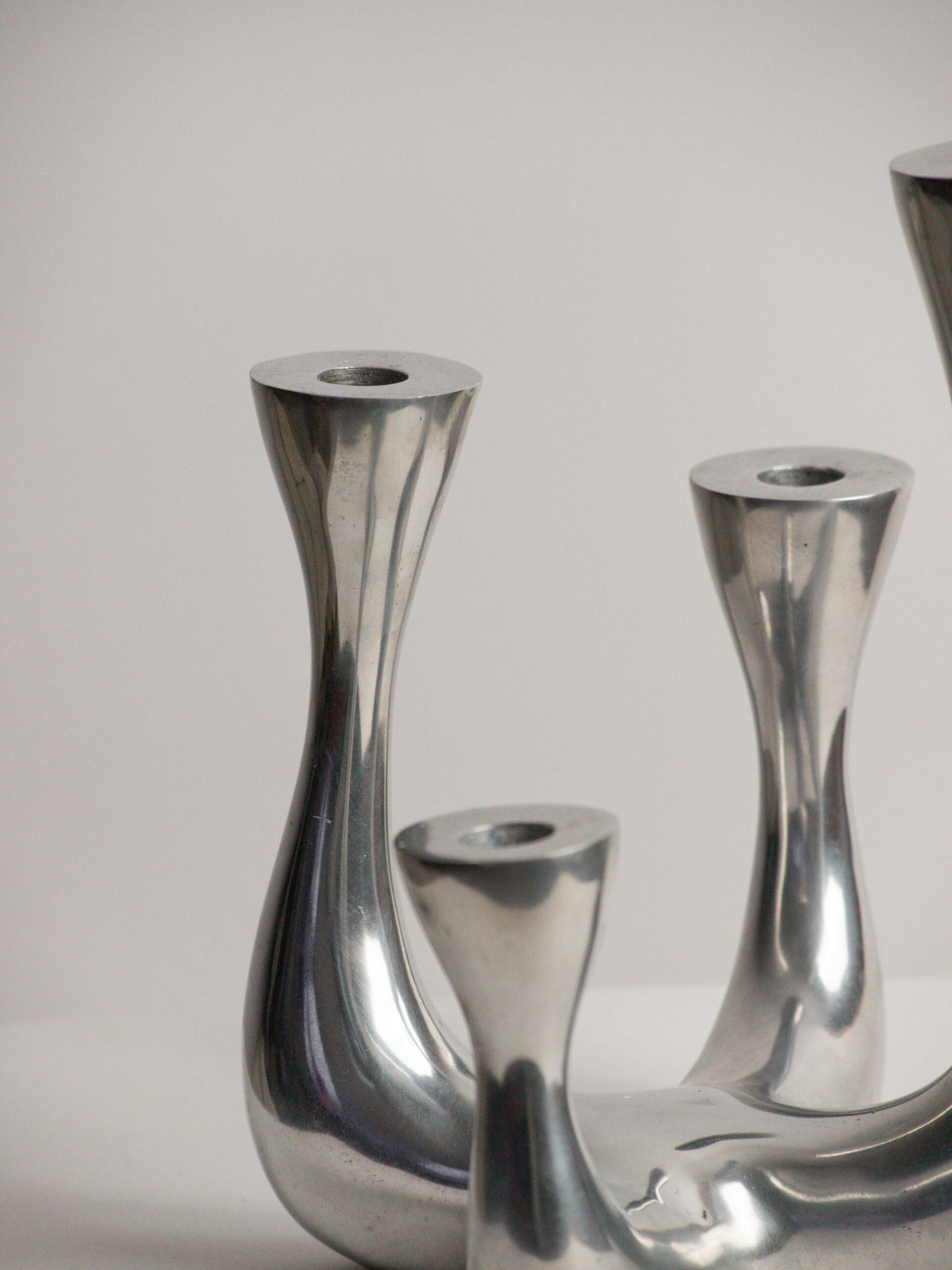 Organic Modern Four-Arm Candelabra in Polished Cast Aluminium, Swan Neck Arms, Northern European 1980s — close-up