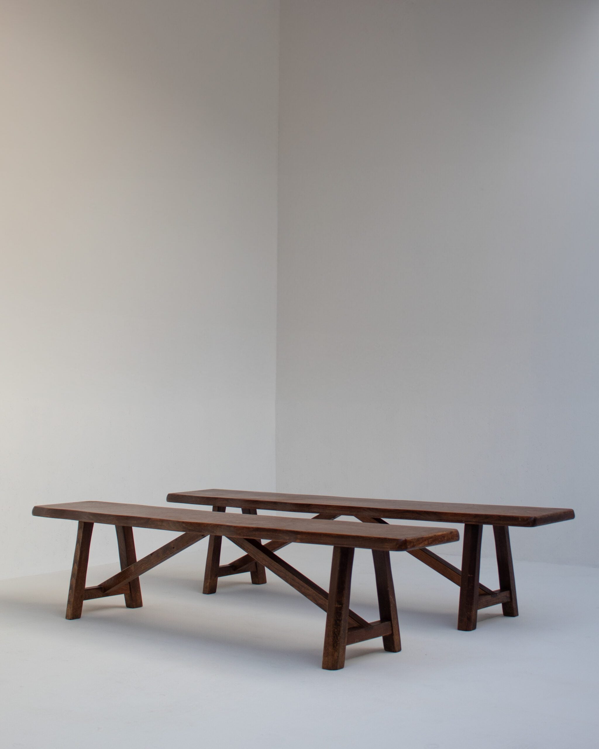 Rustique Bench in Wood — angled view in minimalist setting