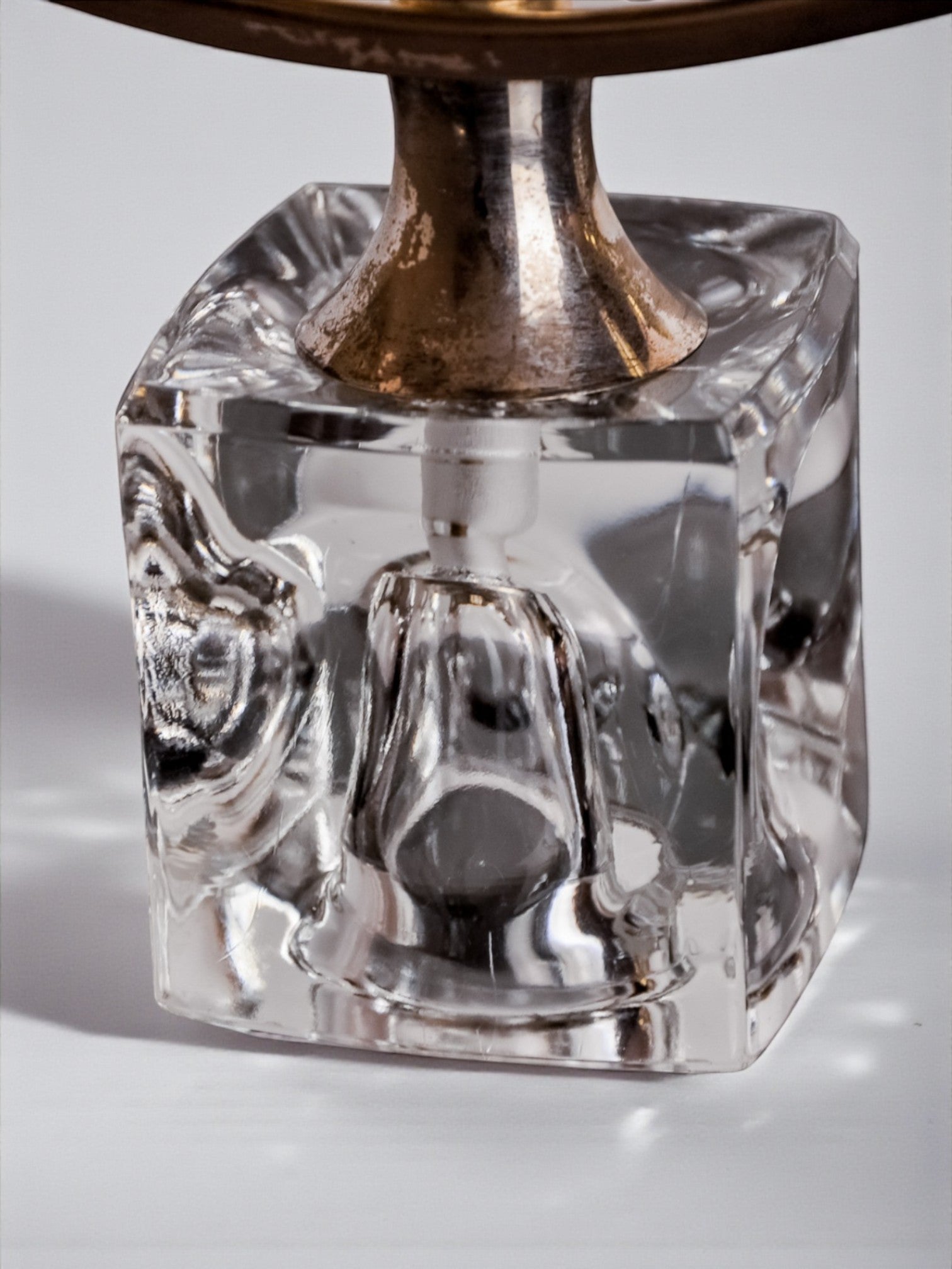 Ice Cube Candleholder by Peill & Putzler, 1970's — close-up of glass base with brass detail