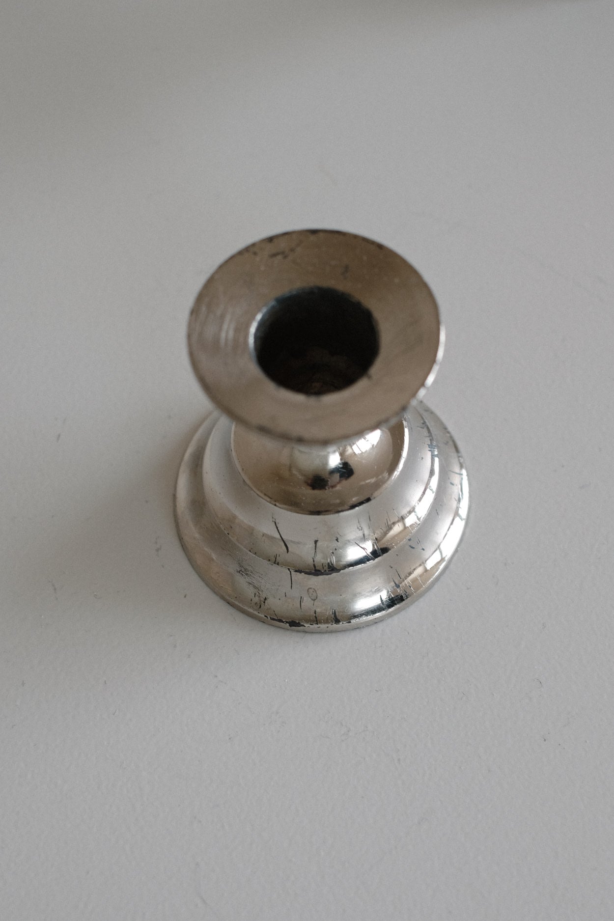 Set of 2 Candle Holders — top view of polished silver surface
