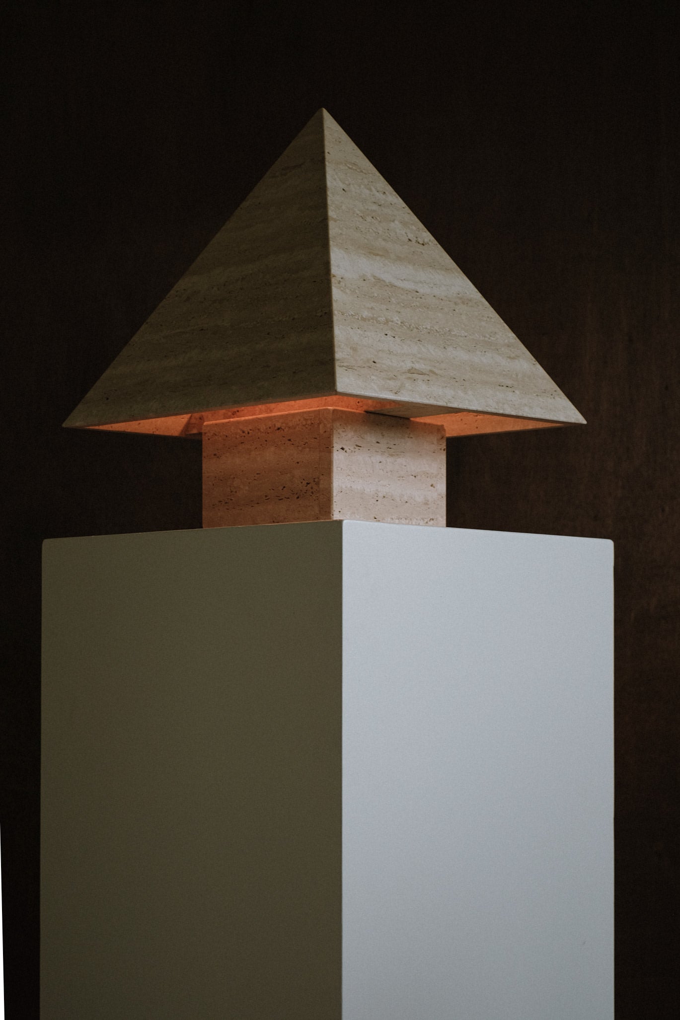 Travertine Pyramid Table Lamp — angled view highlighting textured stone base