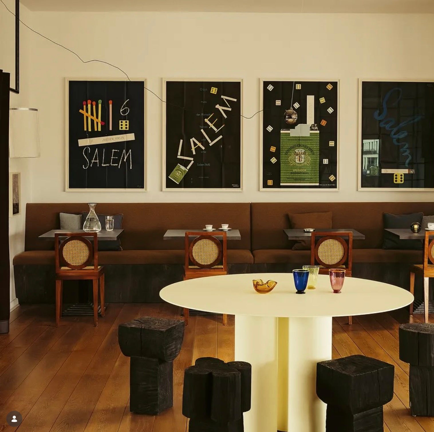 Burnt Black Coffee Tables/Stools — arranged in modern café setting