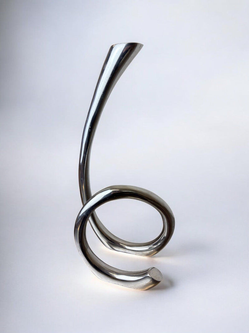 Biomorphic Candleholder, Spain, 1970s — close-up of polished metal surface