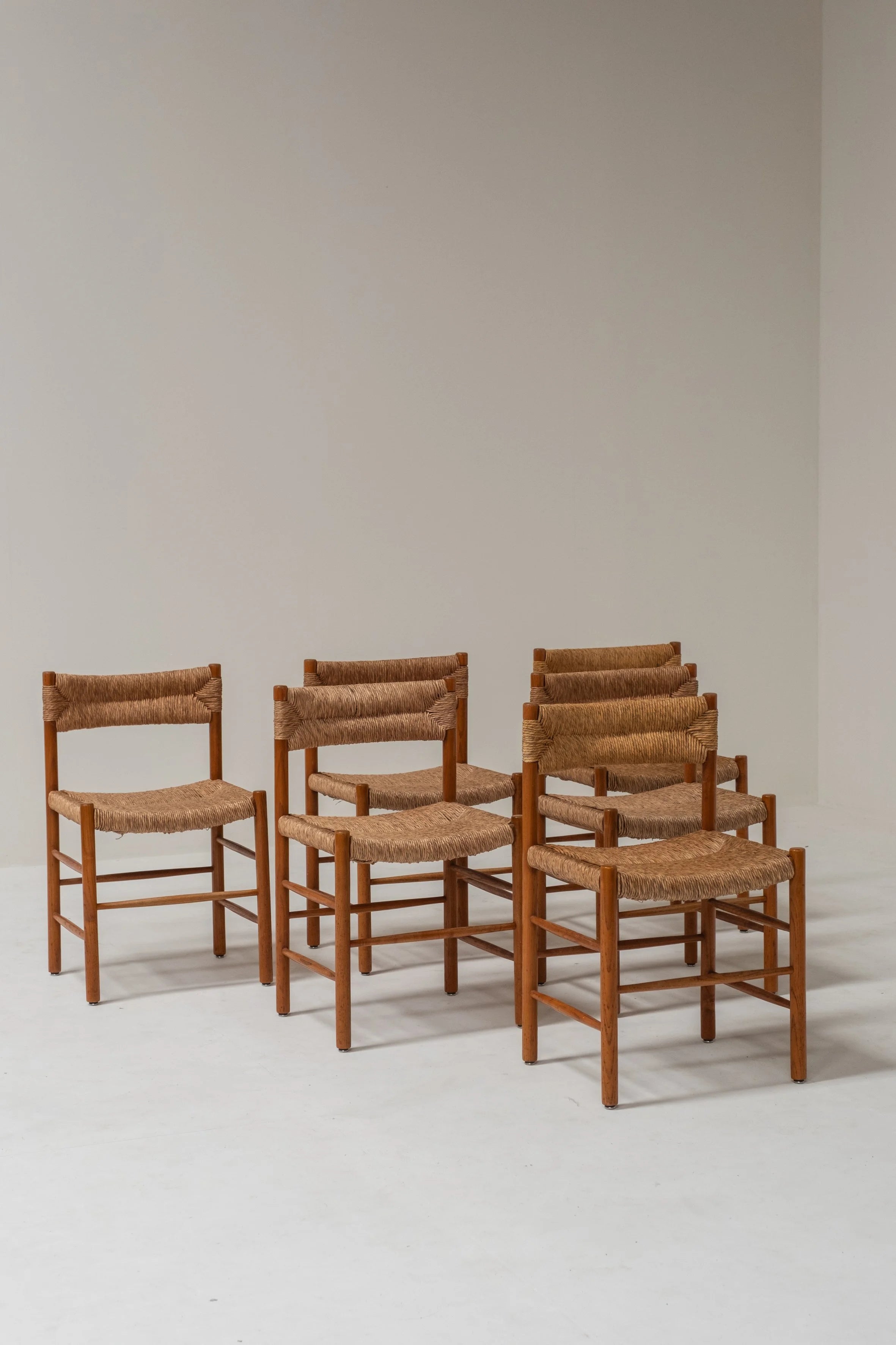 Set of 6 Charlotte Perriand Dordogne Chairs — side angle