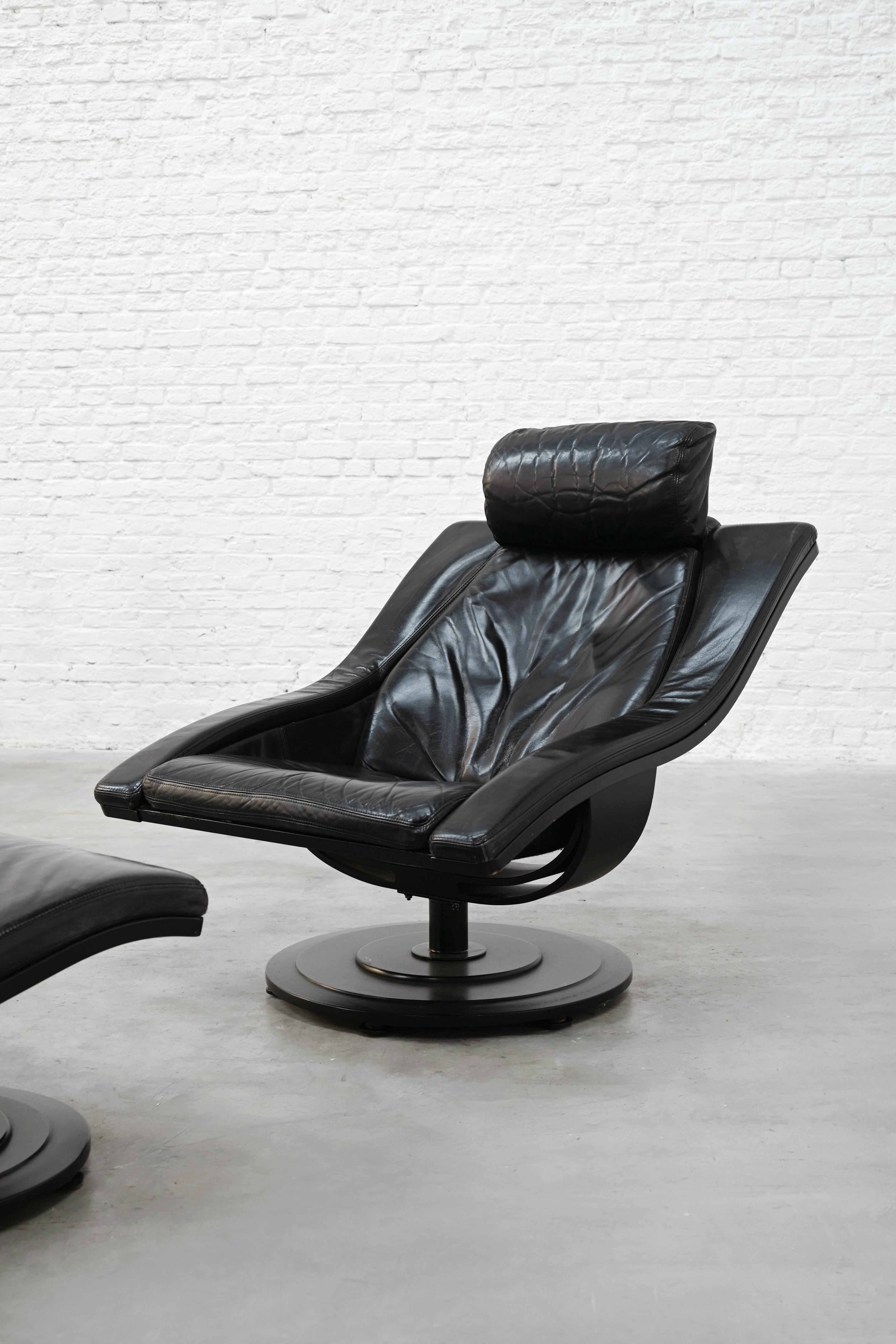 Swivel Lounge Chair and Ottoman by Takashi Okamura for Nelo Möbel Sweden — black leather chair in minimalist setting