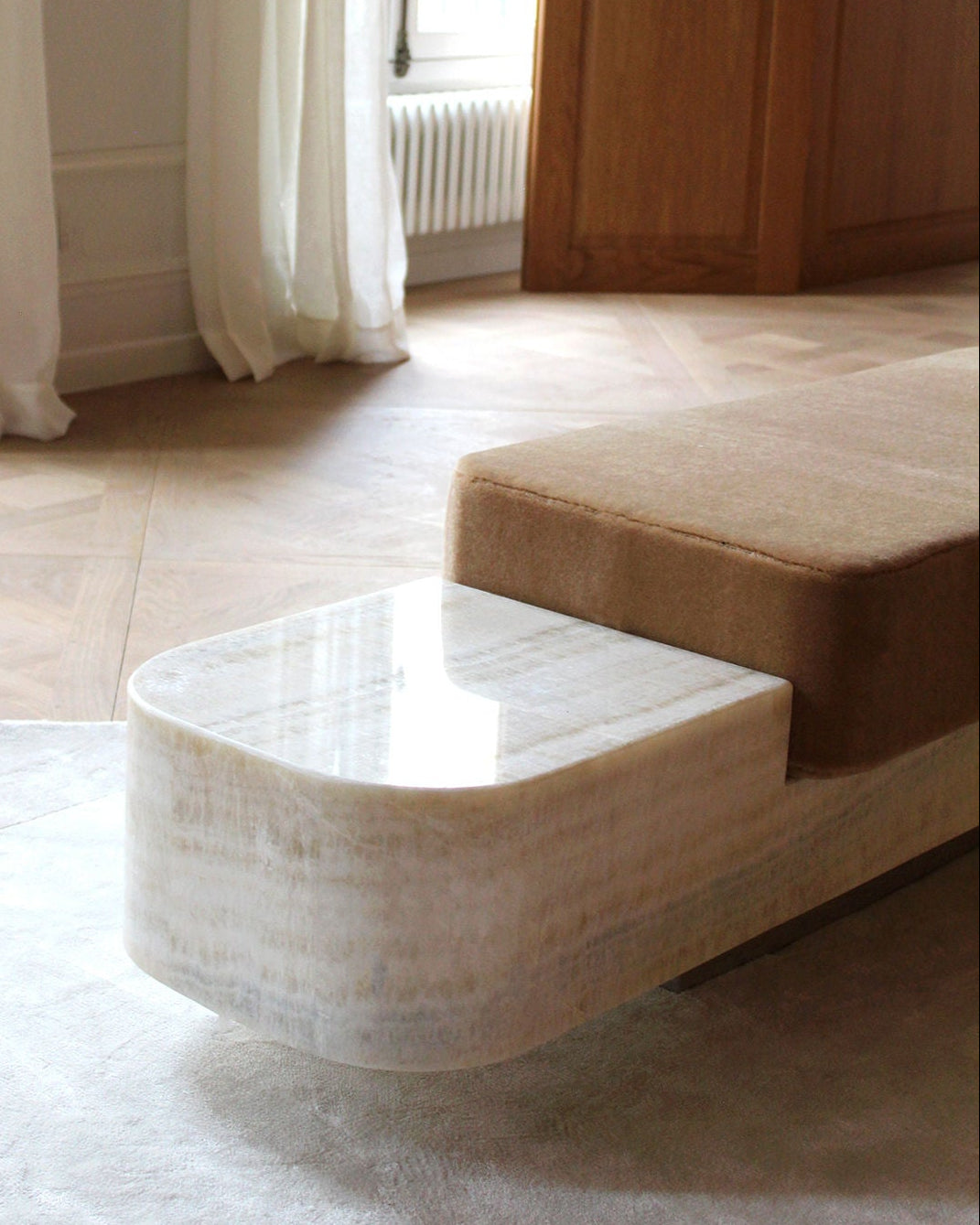 Ran Ivory Onyx Bench — back view highlighting soft upholstery and onyx base