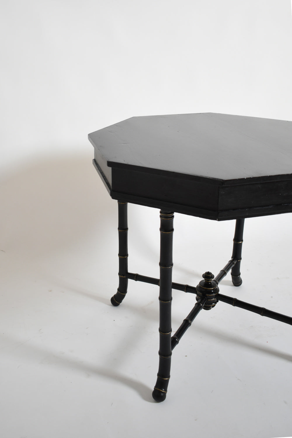 Faux Bamboo Octogonal Table, 1910s — top view showing black surface and legs
