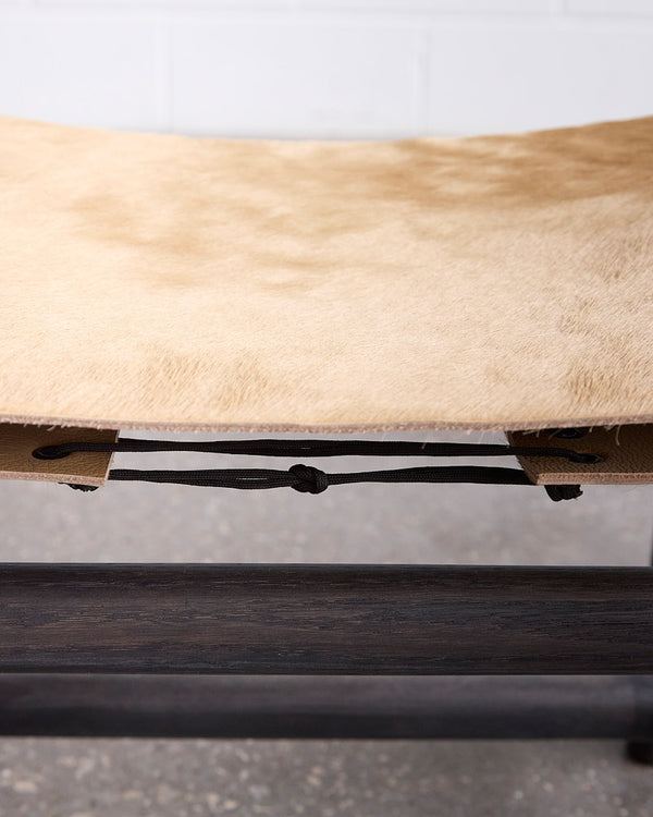 2-Seater Hair on Hide Lyndoe Bench — close-up of tan hide seat attachment