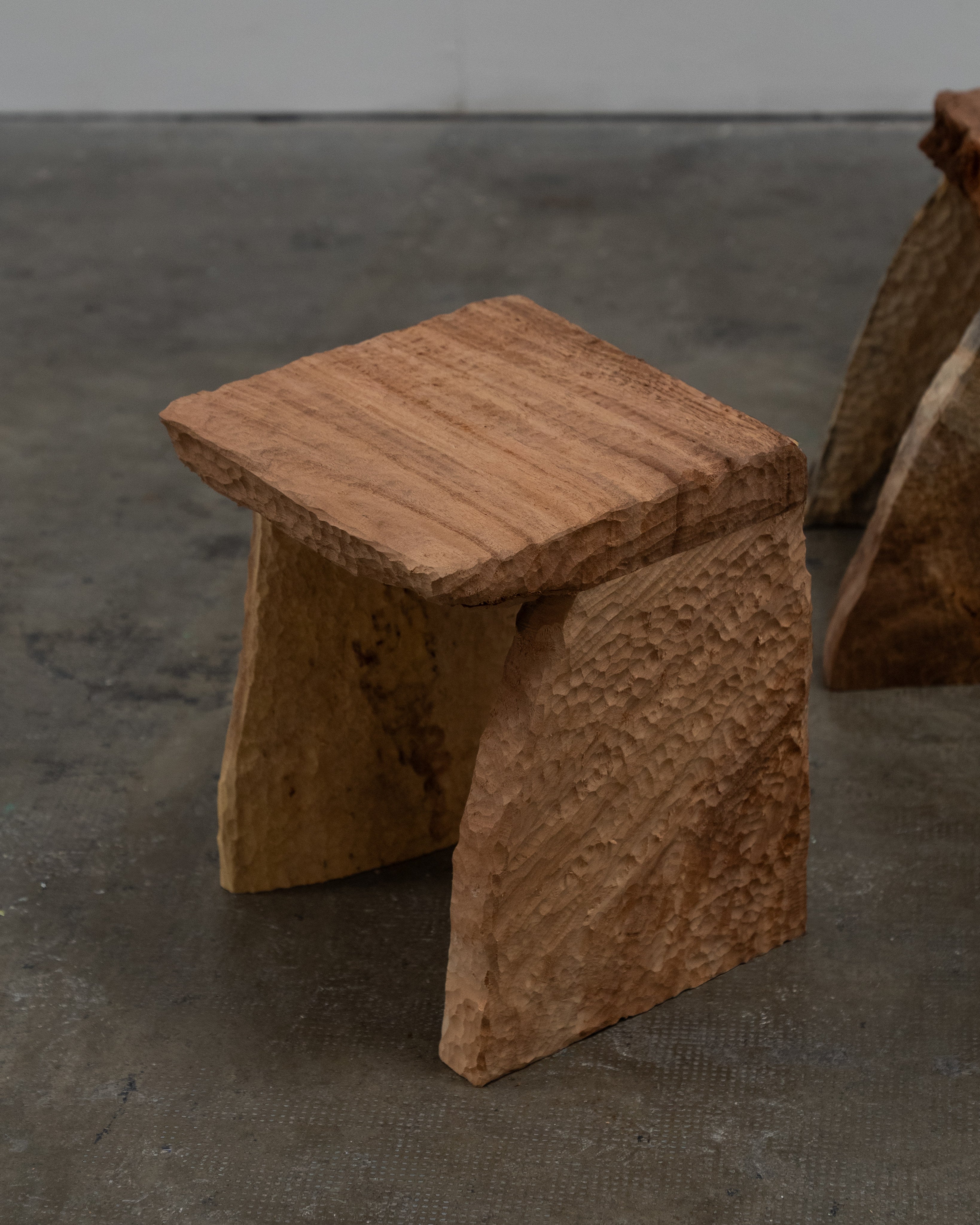 Massif Carved Stool in Eucalyptus Wood — close-up