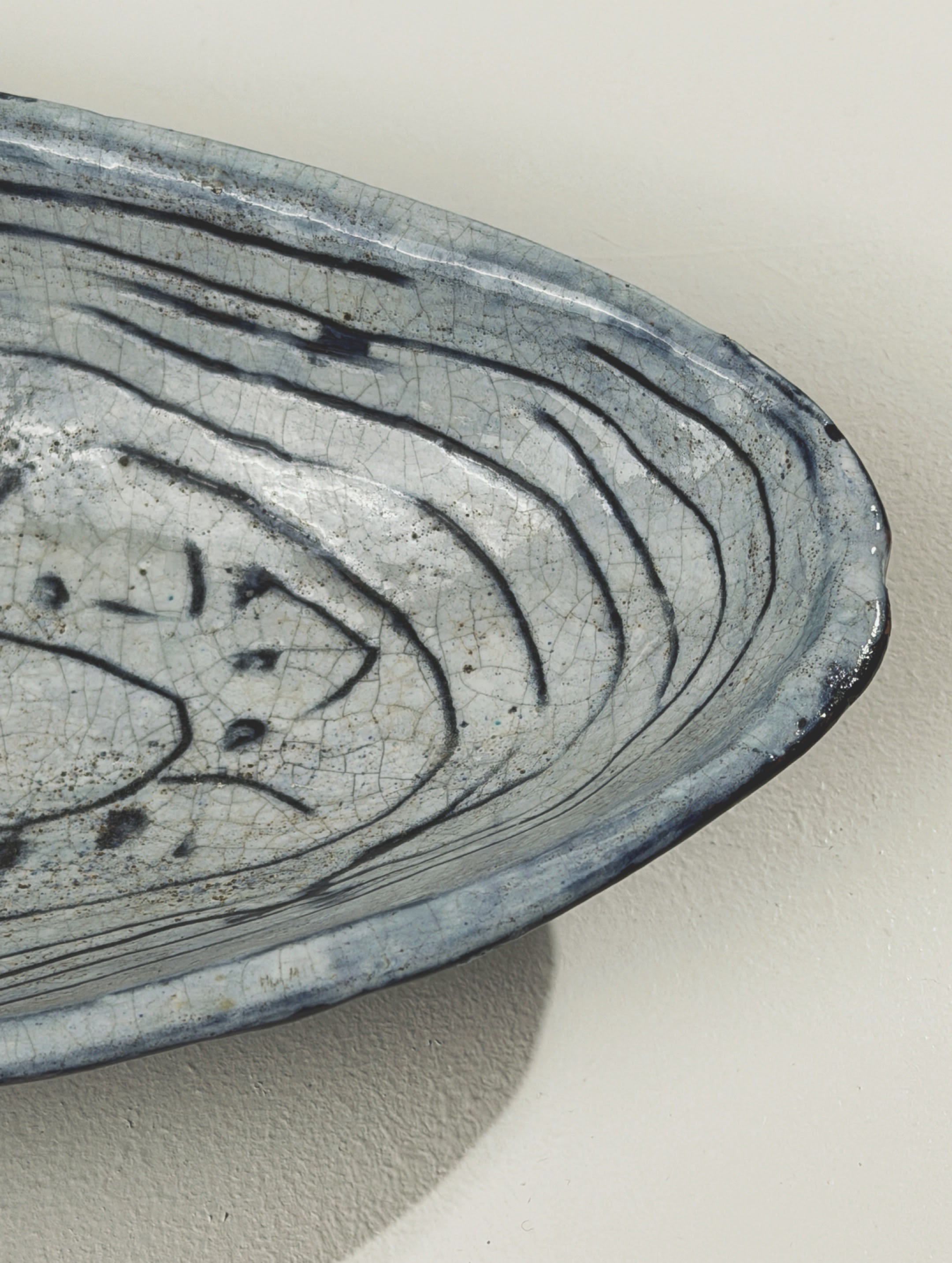 Large Oval Ceramic Dish, France, 1964. — back view showing textured blue glaze