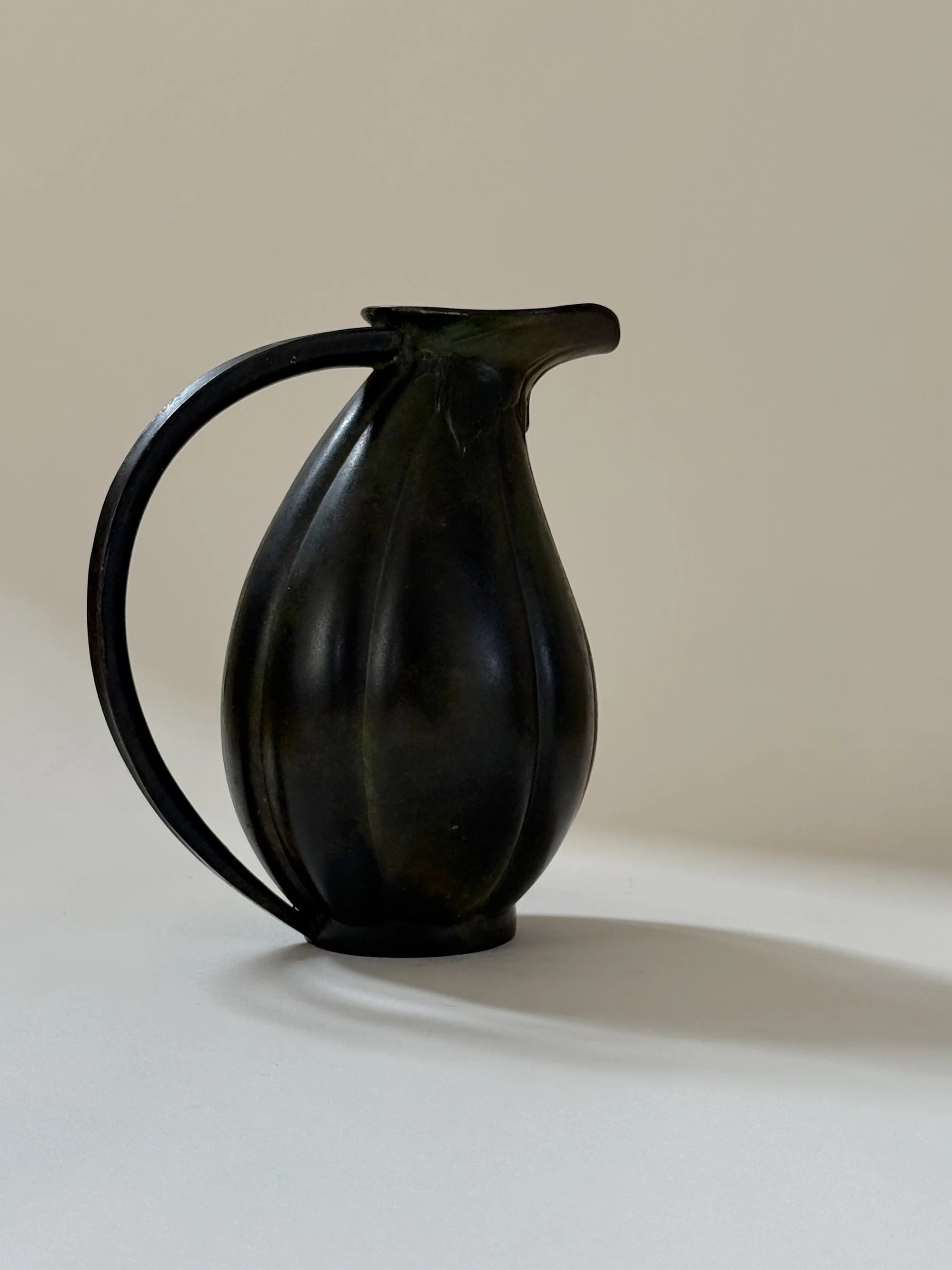 Danish Bronze Vase with Ribbed Form, 1910s — close-up of dark bronze texture