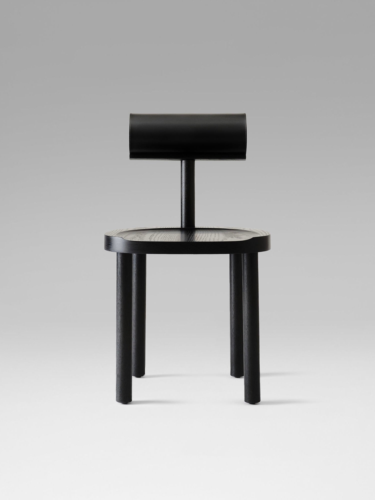 UNA Chair by Estudio Persona — side view of black wooden chair