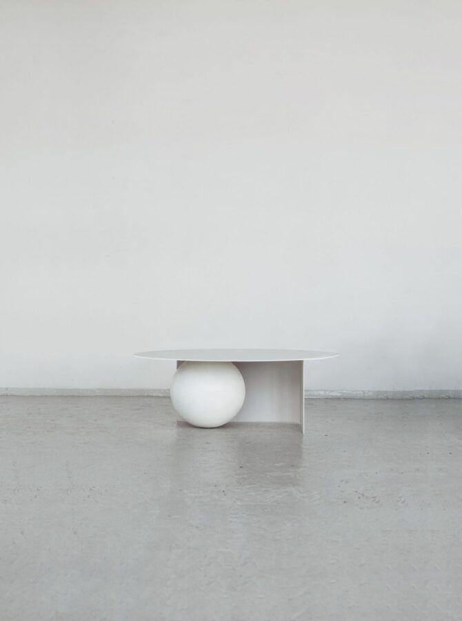 FUKU Coffee Table — side angle showing white tabletop and round base