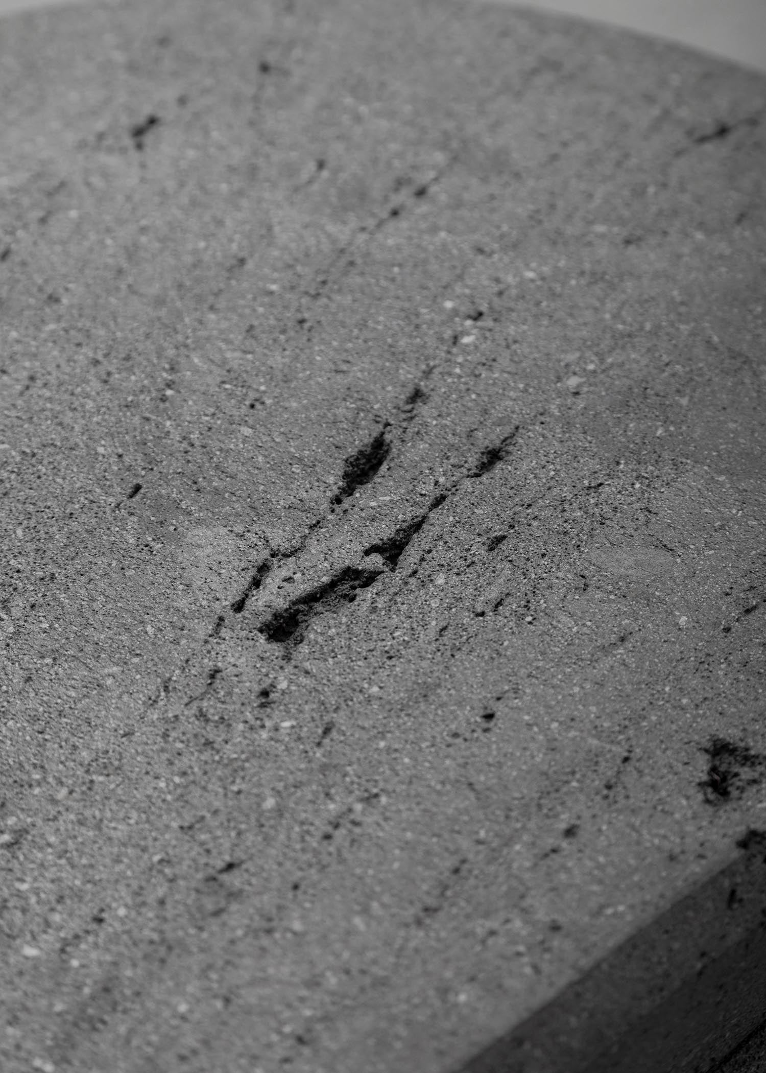 CENTRO Coffee Table Handcarved Volcanic Stone — close-up