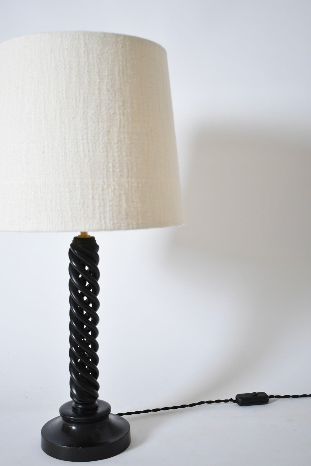 Turned ebonised wooden lamp, 1960s — side angle