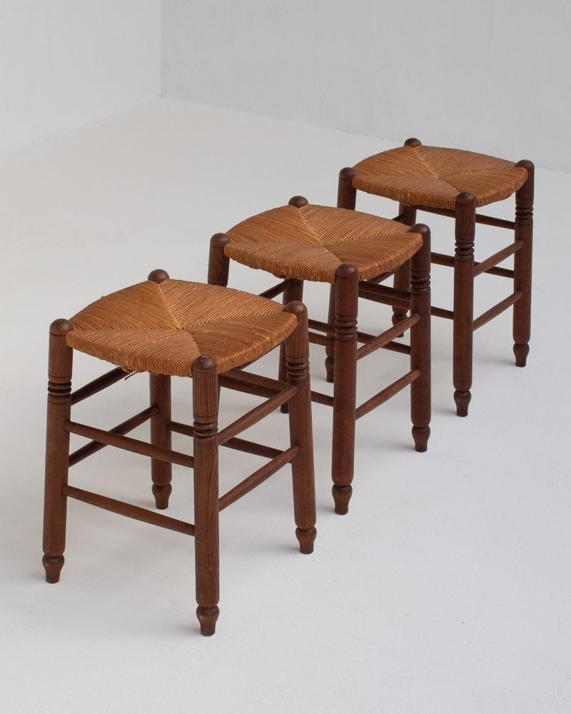 Set of 3 French Rattan Top Stools in Solid Wood by Malata Antwerp | The Oblist — handcrafted rattan, warm wood tones