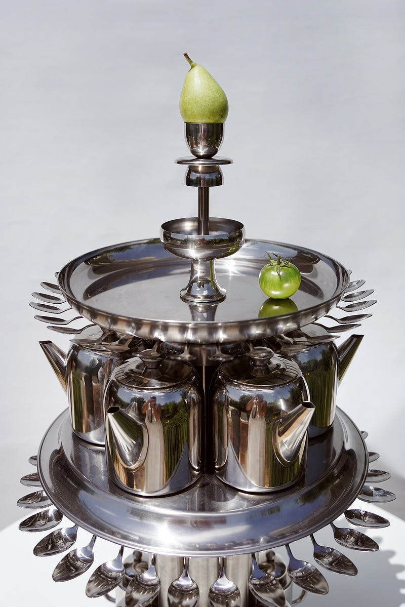 MAD TEA TABLE — detail view