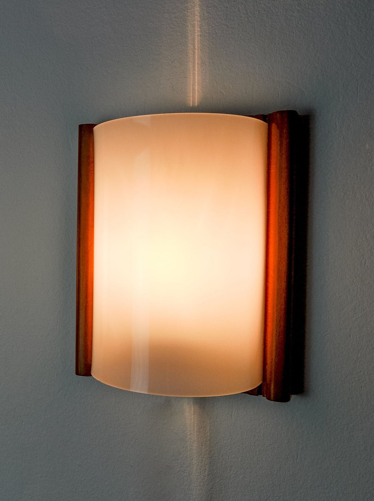 Mediterranean Pine and Methacrylate Sconce 1980's — side angle showing warm wood and soft light