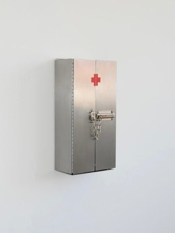 Wax Clock' Wall Candleholder — back view against a white wall