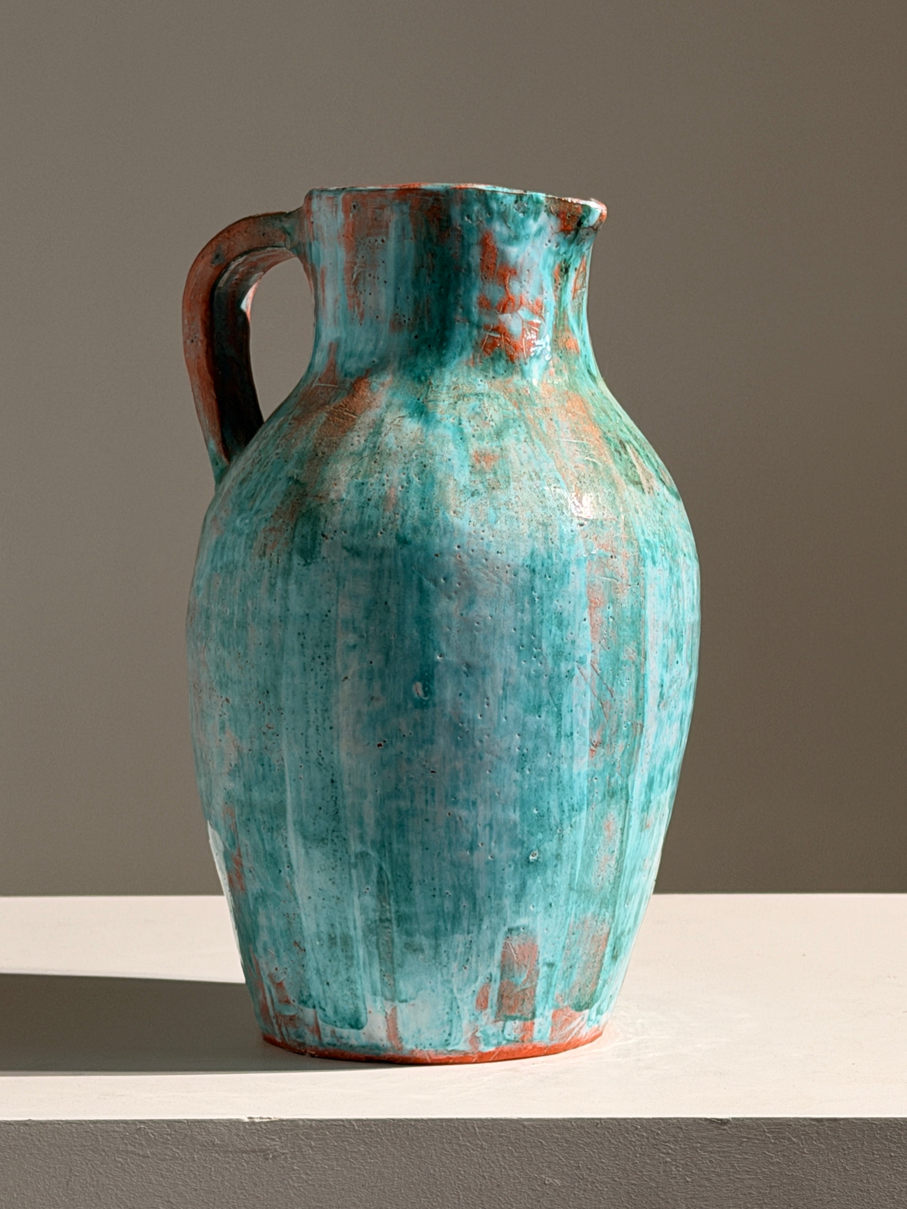 Large pitcher in green glazed earthenware, south of France, circa 1960. by Figuresdesign | The Oblist