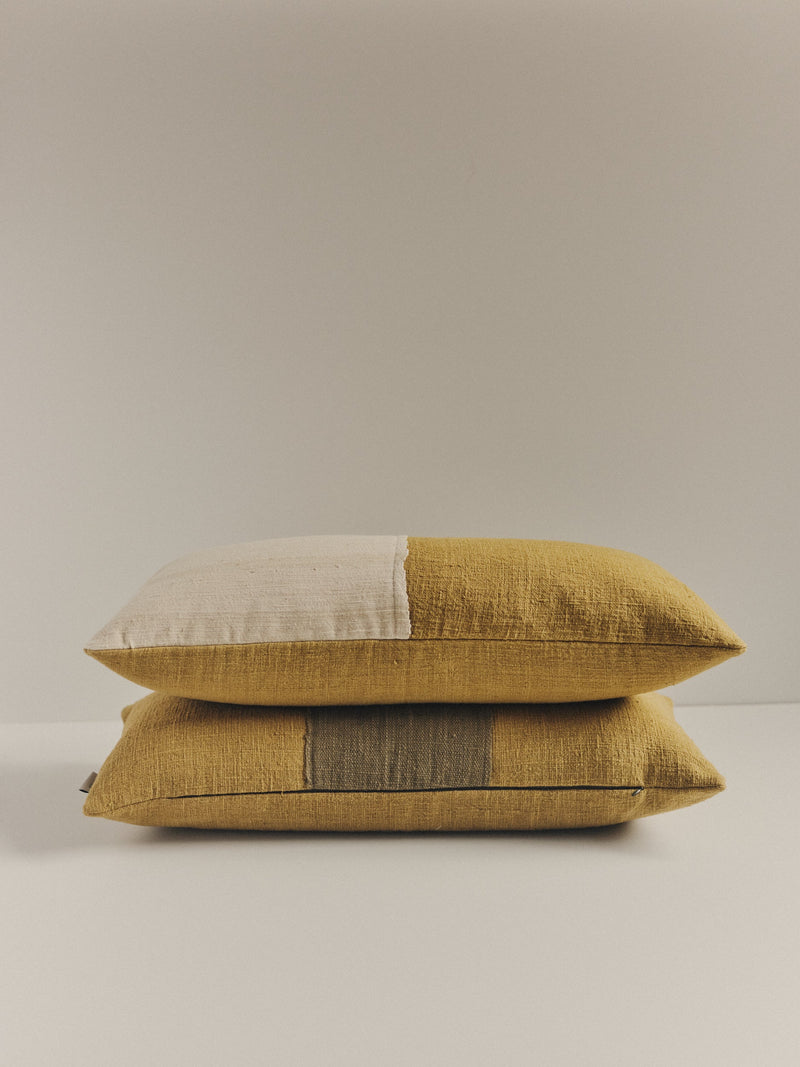 Handwoven cushion in beige and green by Elle La | The Oblist