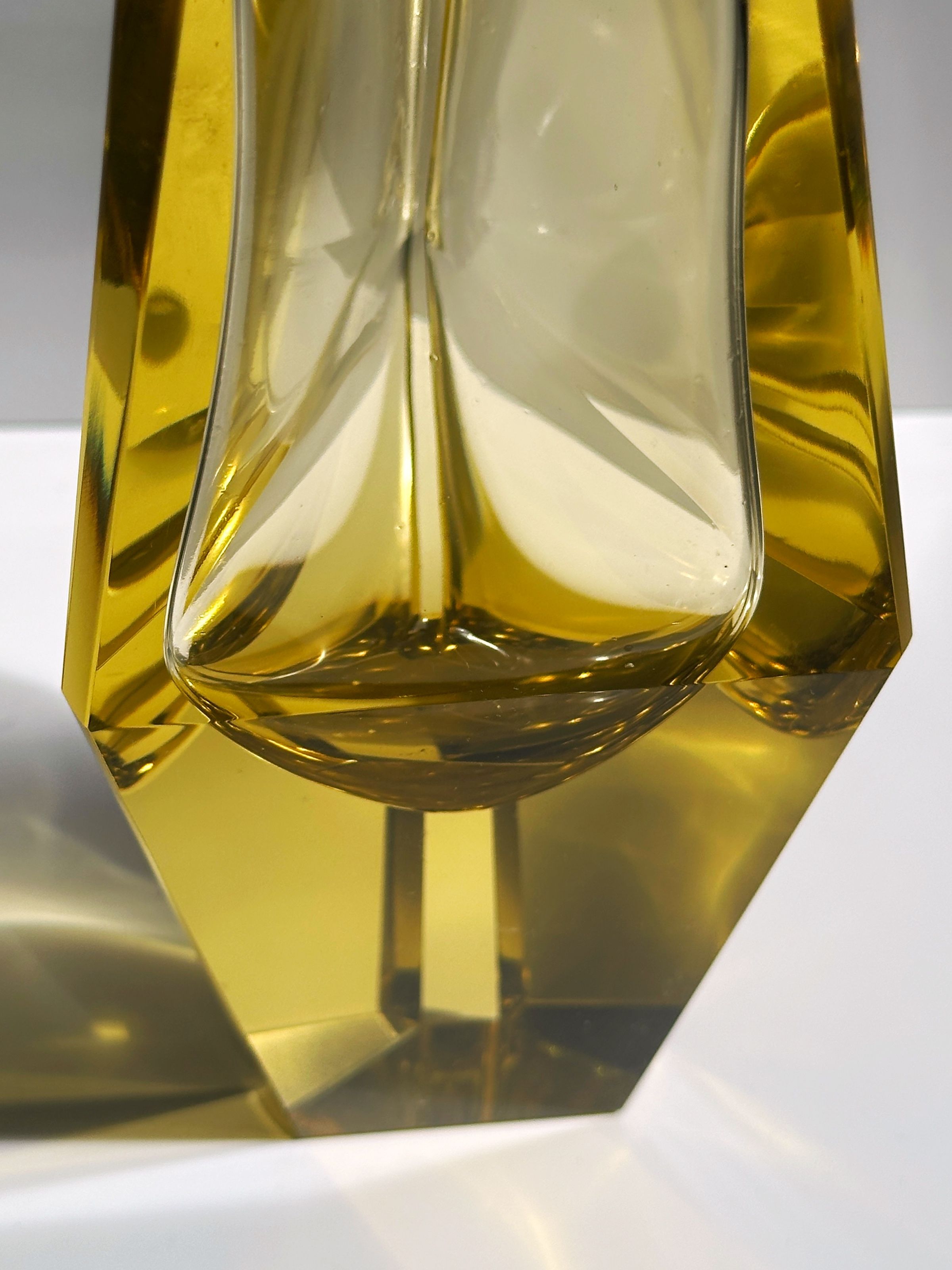 Close-up detail of citrine Murano glass vase showing prismatic facets