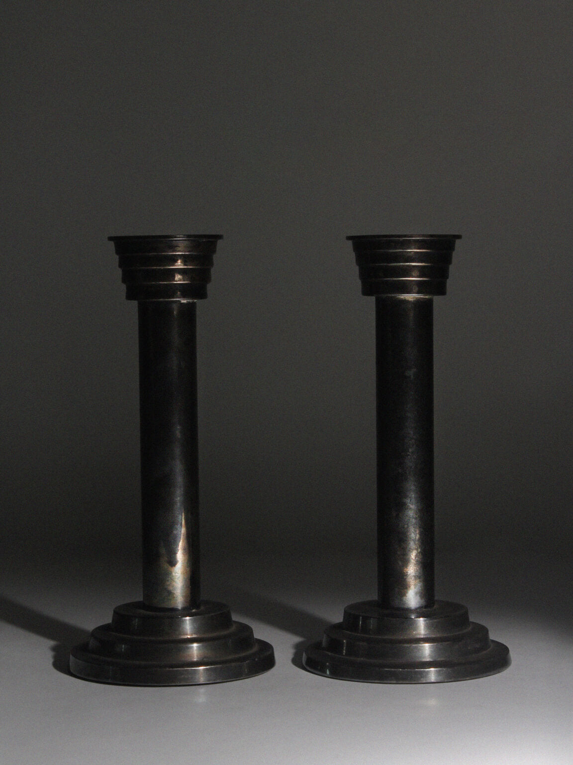 Art Deco Patinated Silver-Plated Metal Candlestick Holders — detail view