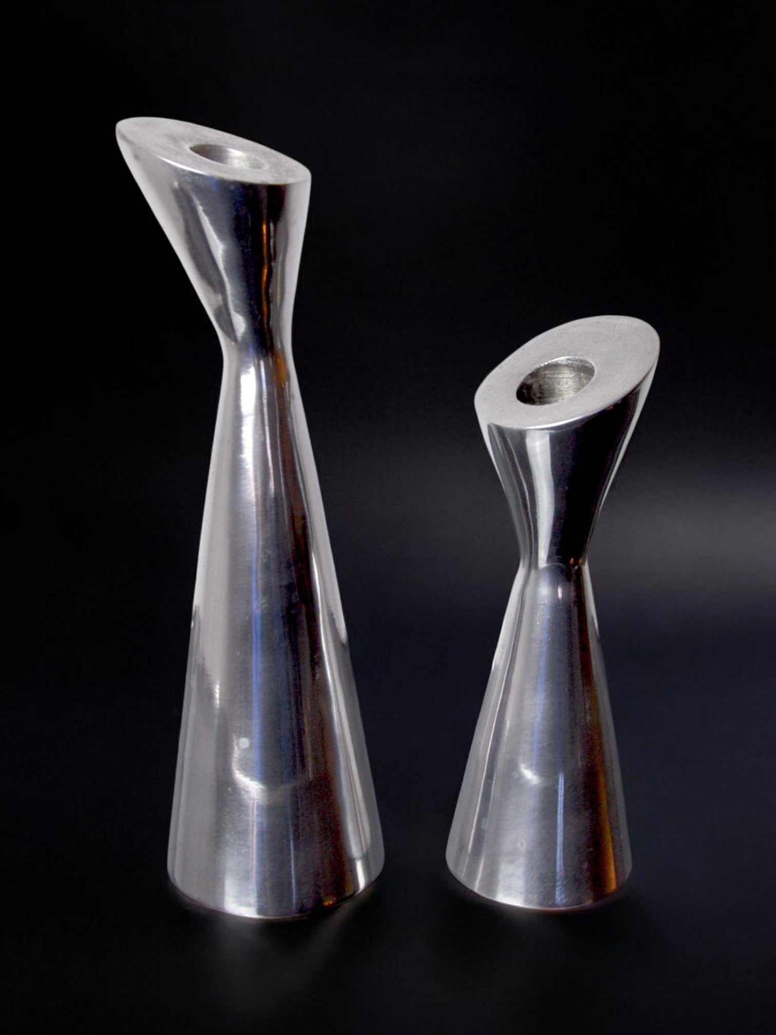 Pair of Swan candlesticks by Matthew Hilton, England, 1980 by Malamar Studio | The Oblist