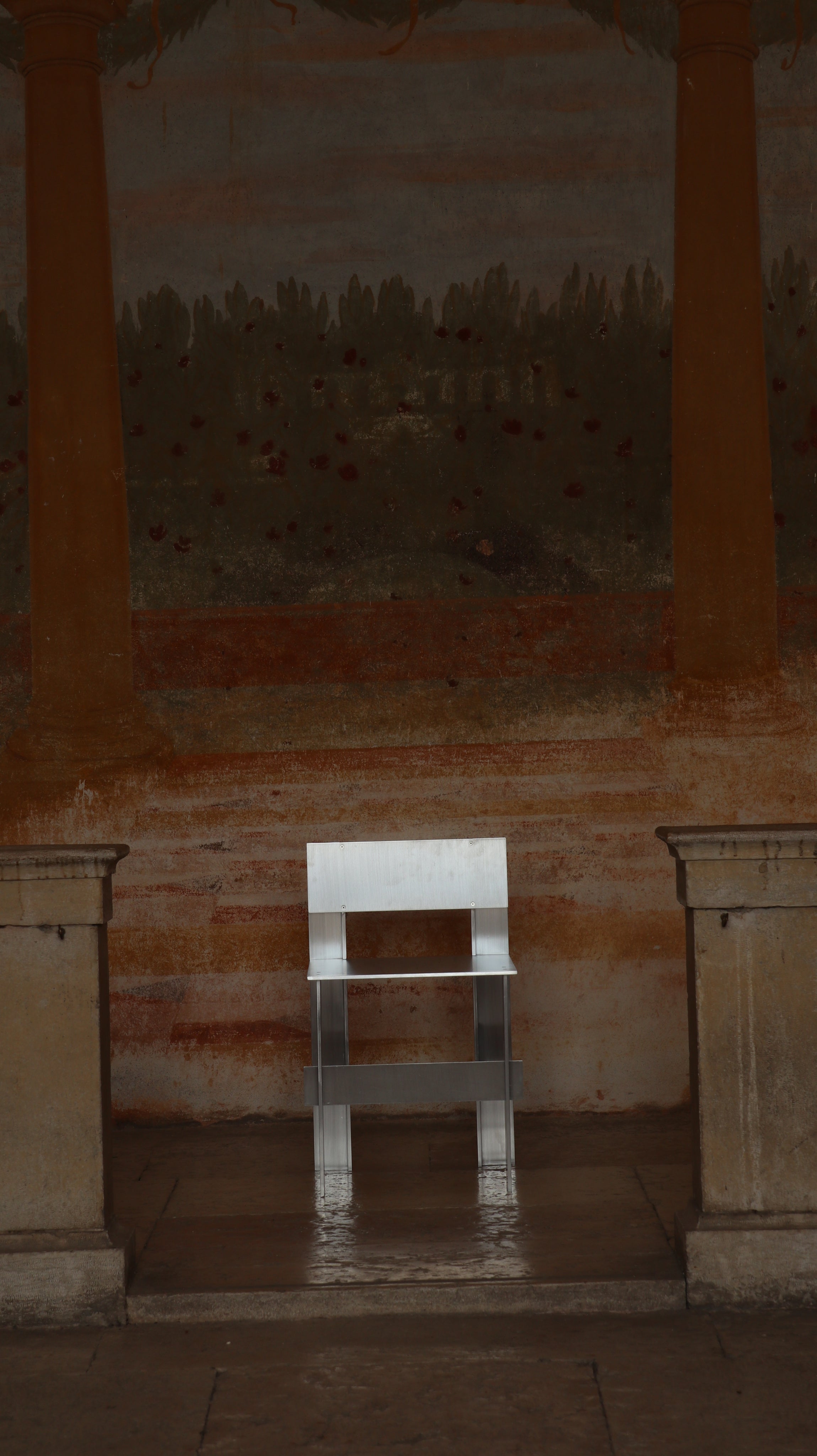 AL Chair — clear acrylic chair in historic setting