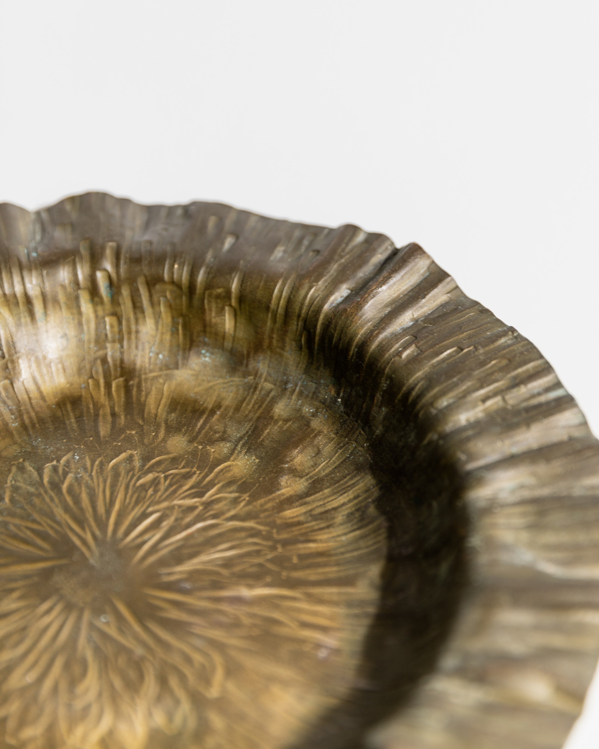 Radiating pattern detail of 1960s Italian brass decorative bowl