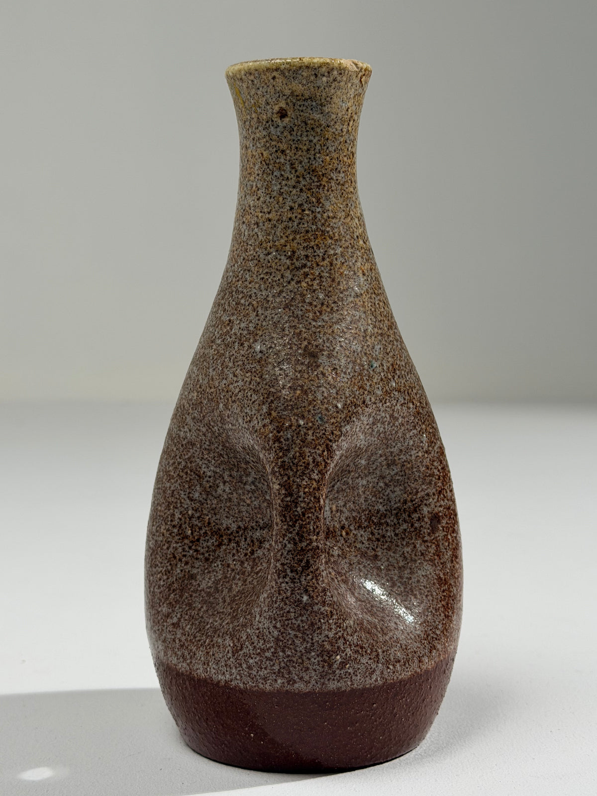 Ceramic pitcher with a pinched handle, Les Potiers d’Accolay, France, circa 1960 — detail view