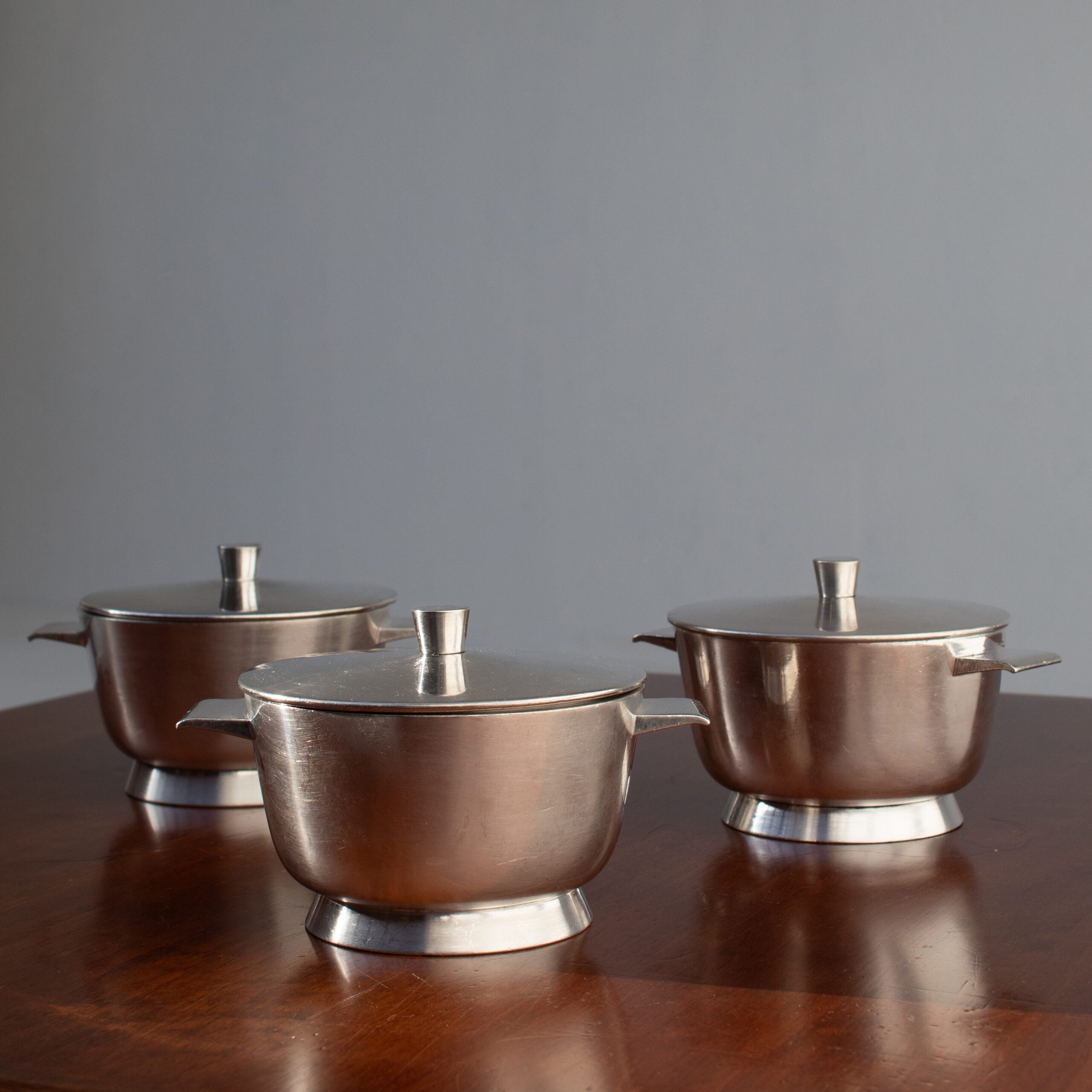 Arthur Krupp Milano Silver Plated Bowls Set — close-up of polished silver bowls on wooden table