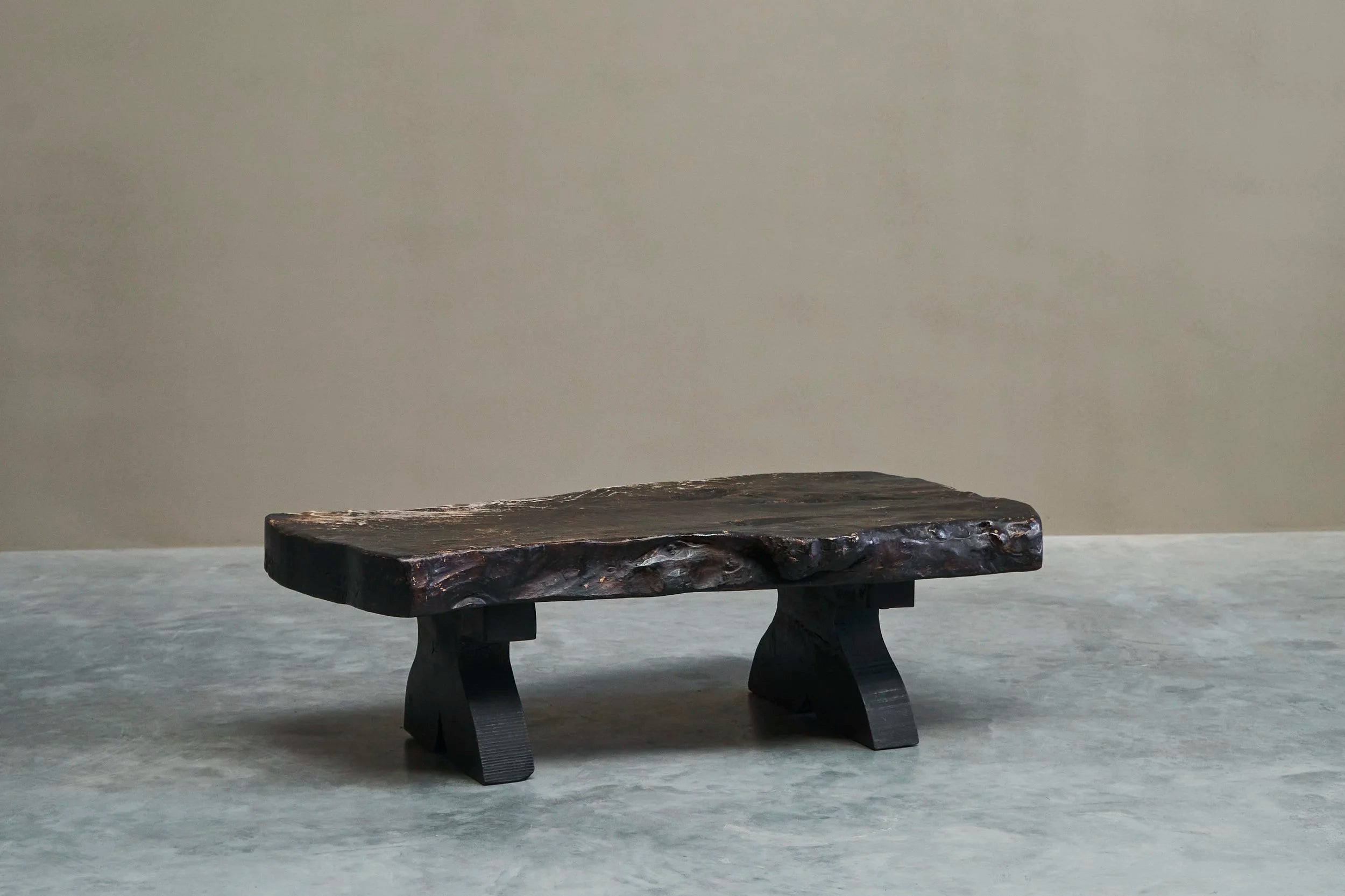Sculptural Live Edge Coffee Table in Solid Dark Stained Wood — in context