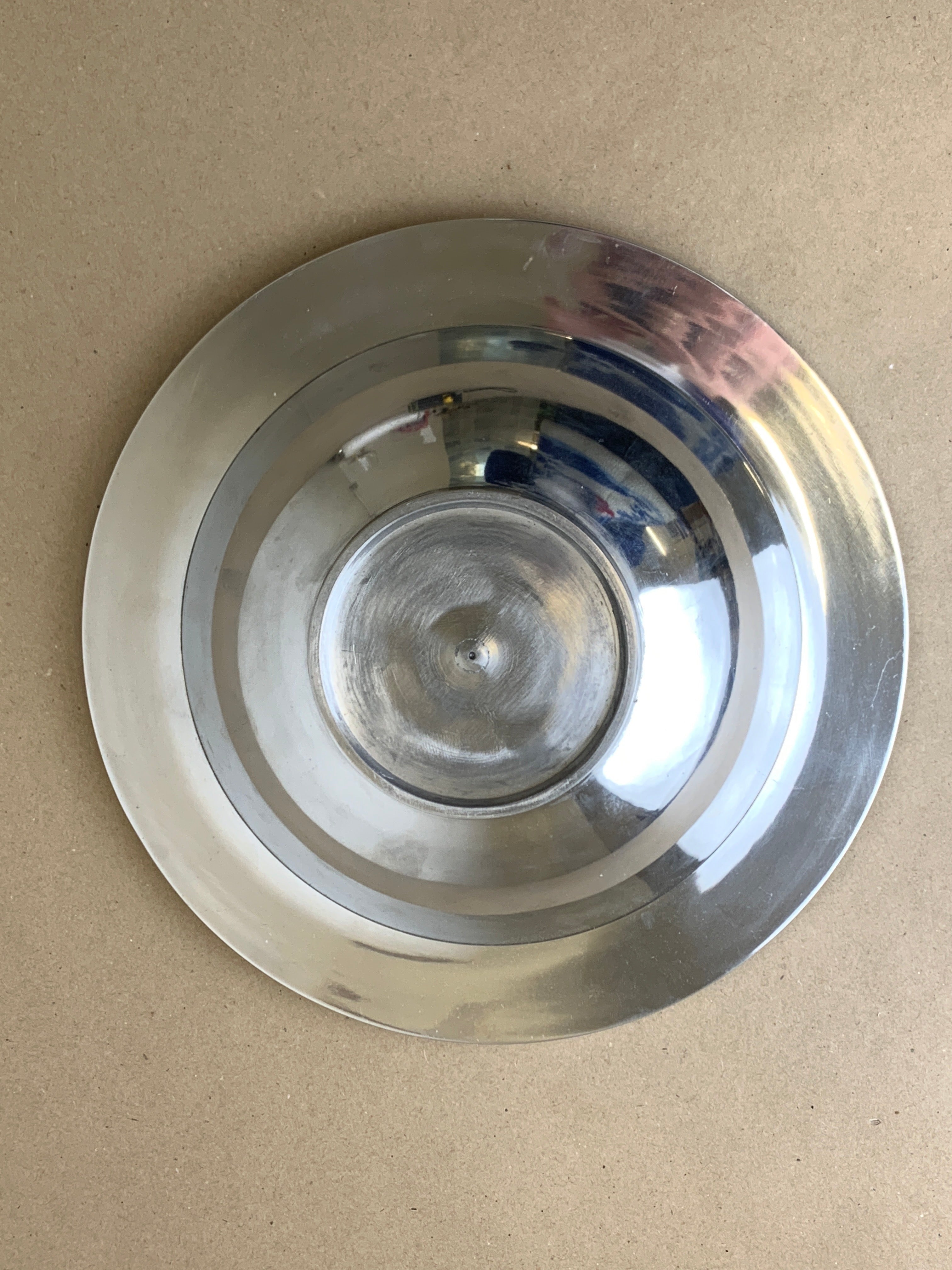 Ridged Circular tray, solid aluminium, Spain, 1980's — top view highlighting reflective surface