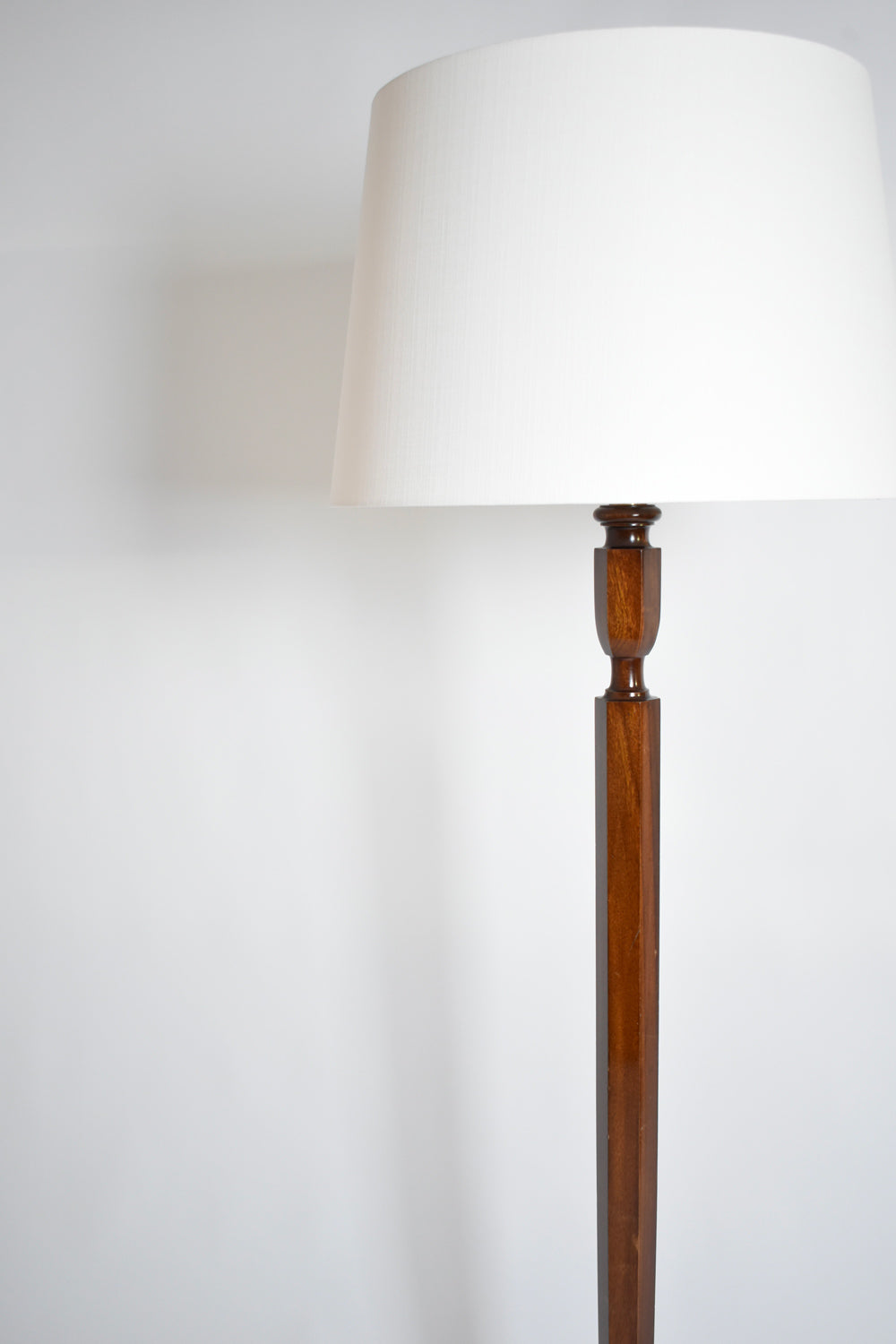 Art Deco Mahogany Floor Lamp — close-up of wooden base and white shade