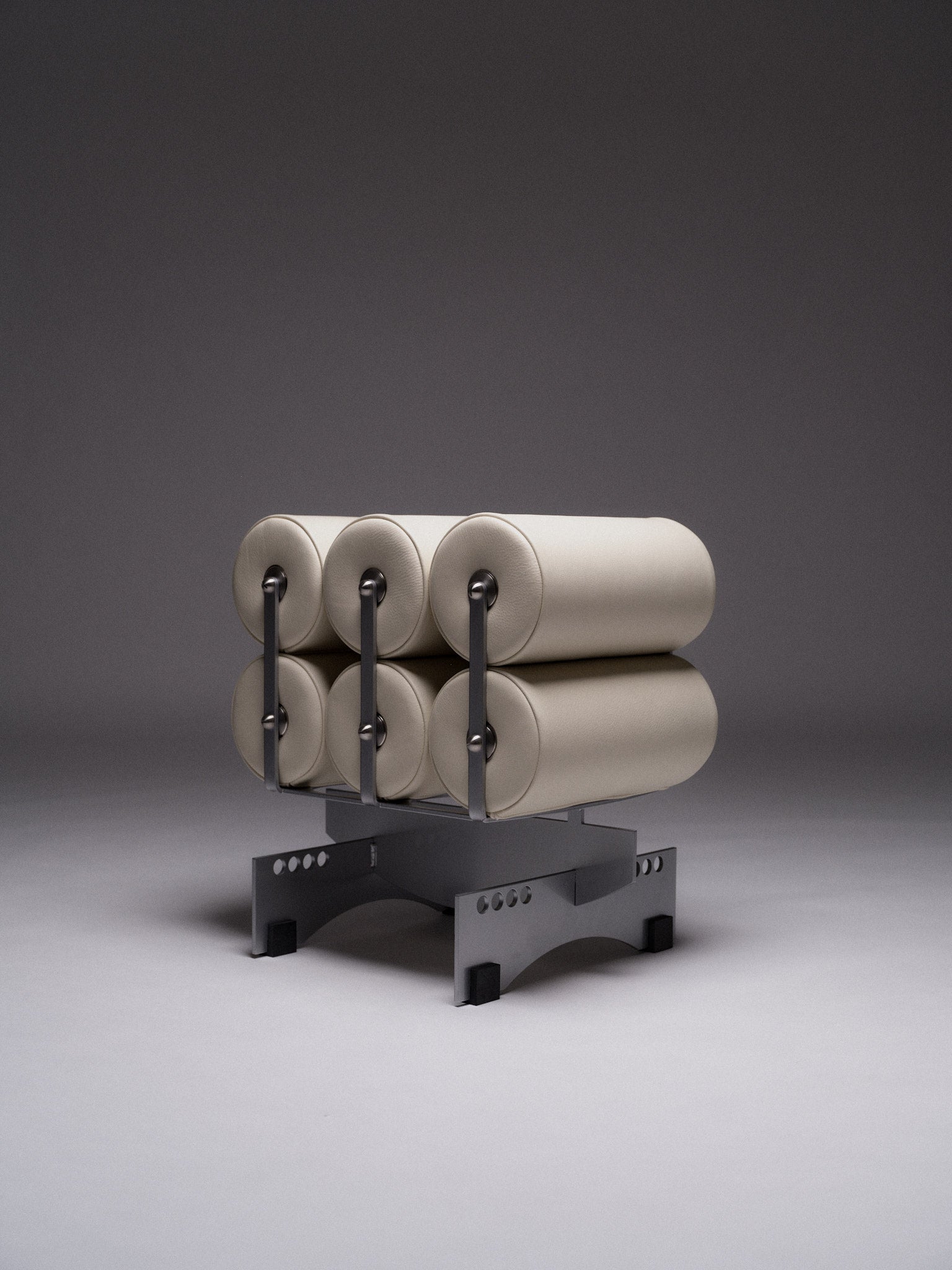 Poggia Alta — side angle showing cream upholstery and metal base